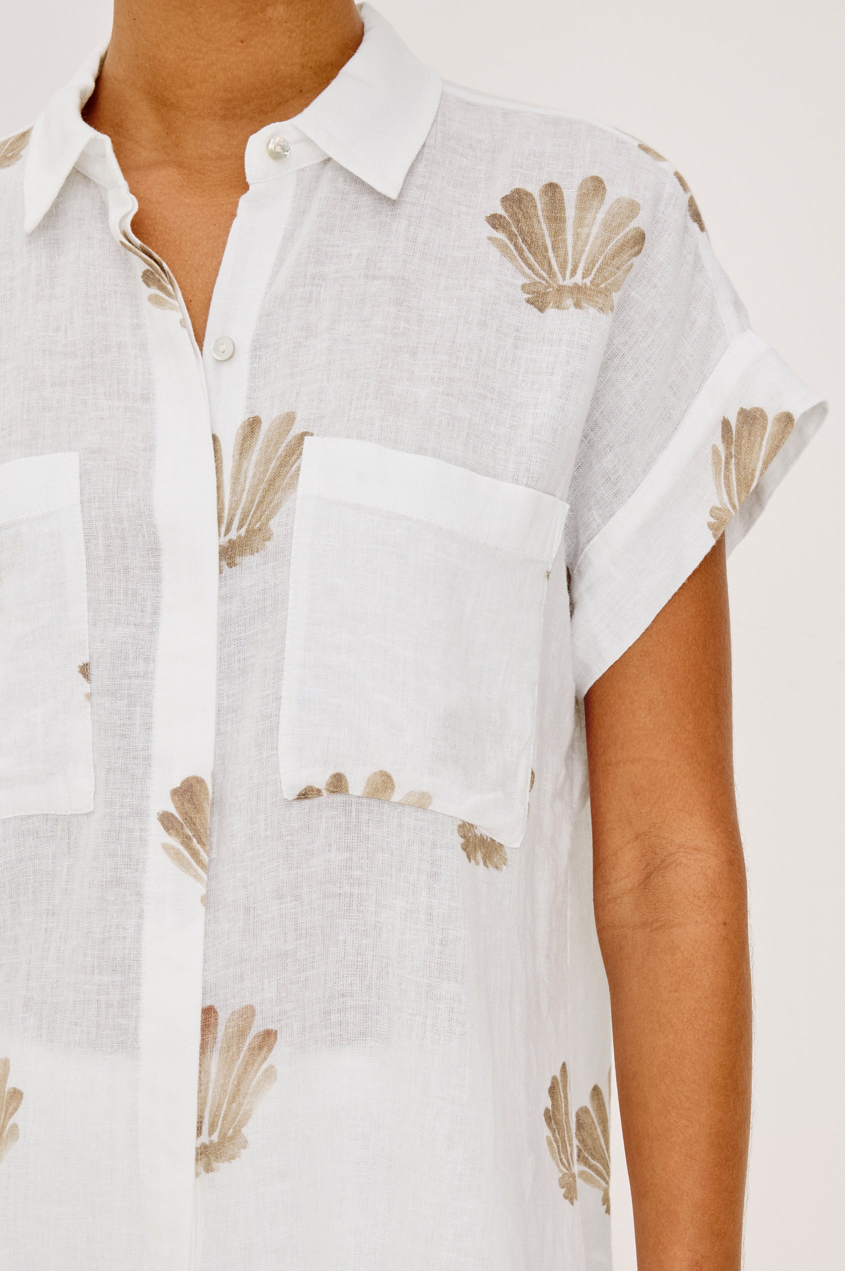 Cito Relaxed Button-Up Shirt in Linen With Collar, Chest Patch Pockets, and Cuffed Cap Sleeves in Taupe Seashells Colorway - Upper Body Front View Featured on Model