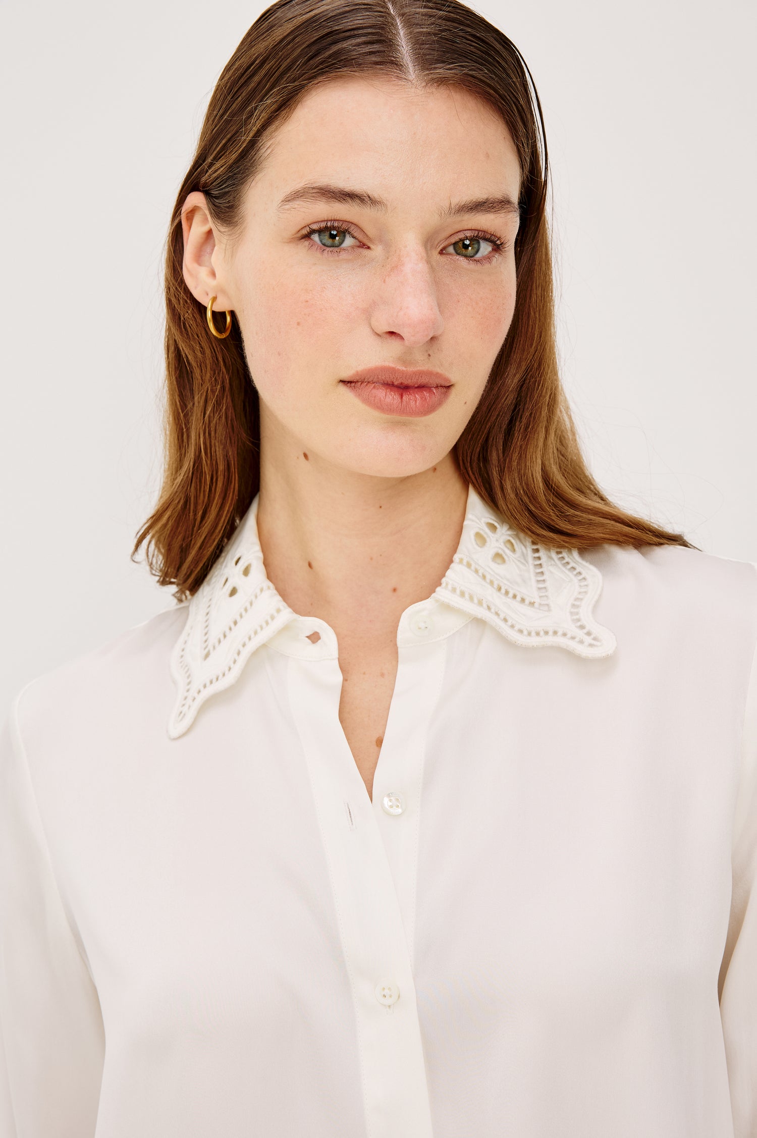 Clarise Button-Up Shirt in Silk Charmeues With Eyelet Embroidered Collar and Cuffs Long Sleeves and Relaxed Fit in Ivory Eyelet Colorway - Upper Body Close Up View Featured on Model