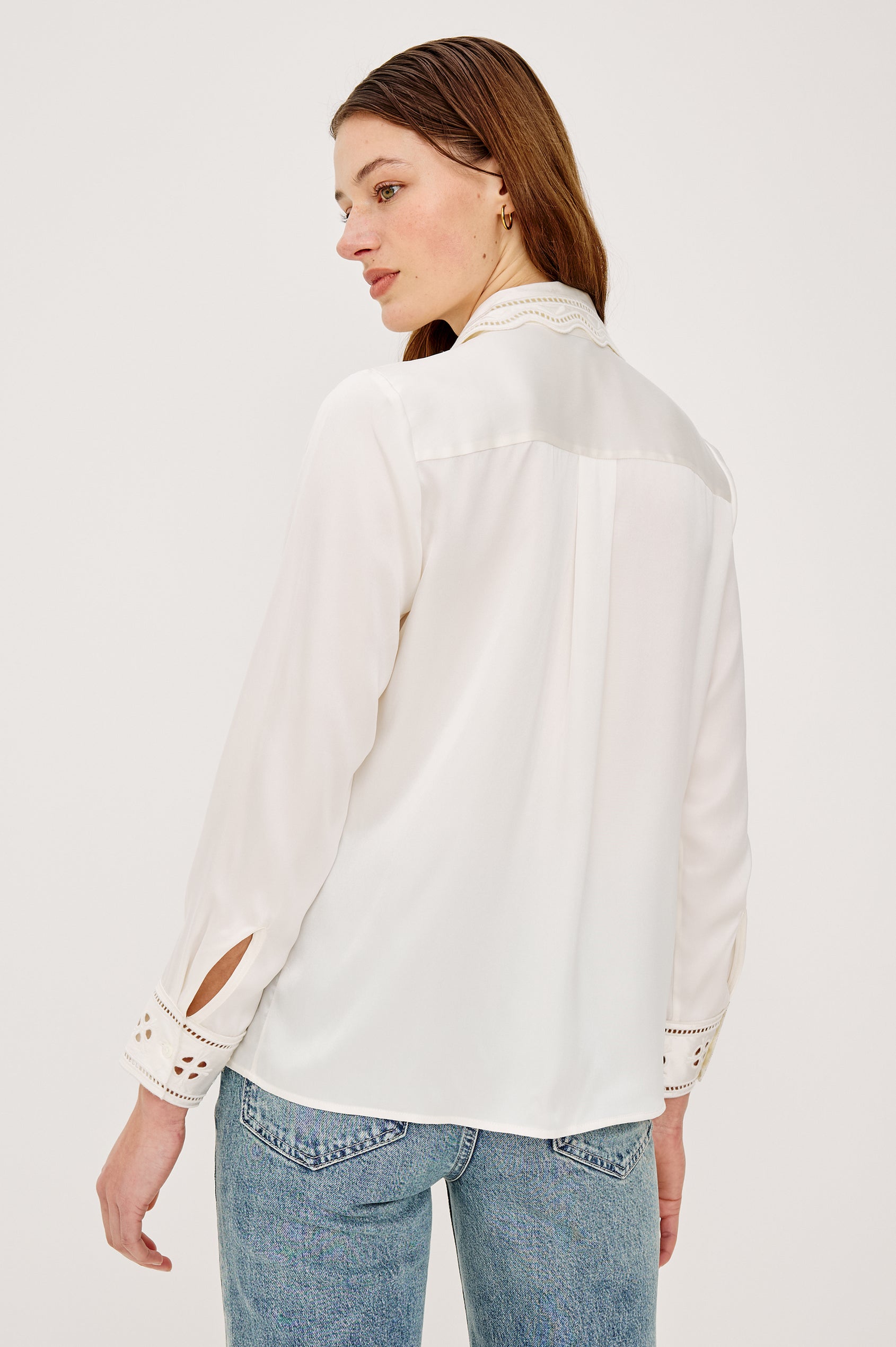 Clarise Button-Up Shirt in Silk Charmeues With Eyelet Embroidered Collar and Cuffs Long Sleeves and Relaxed Fit in Ivory Eyelet Colorway - Upper Body Back View Featured on Model