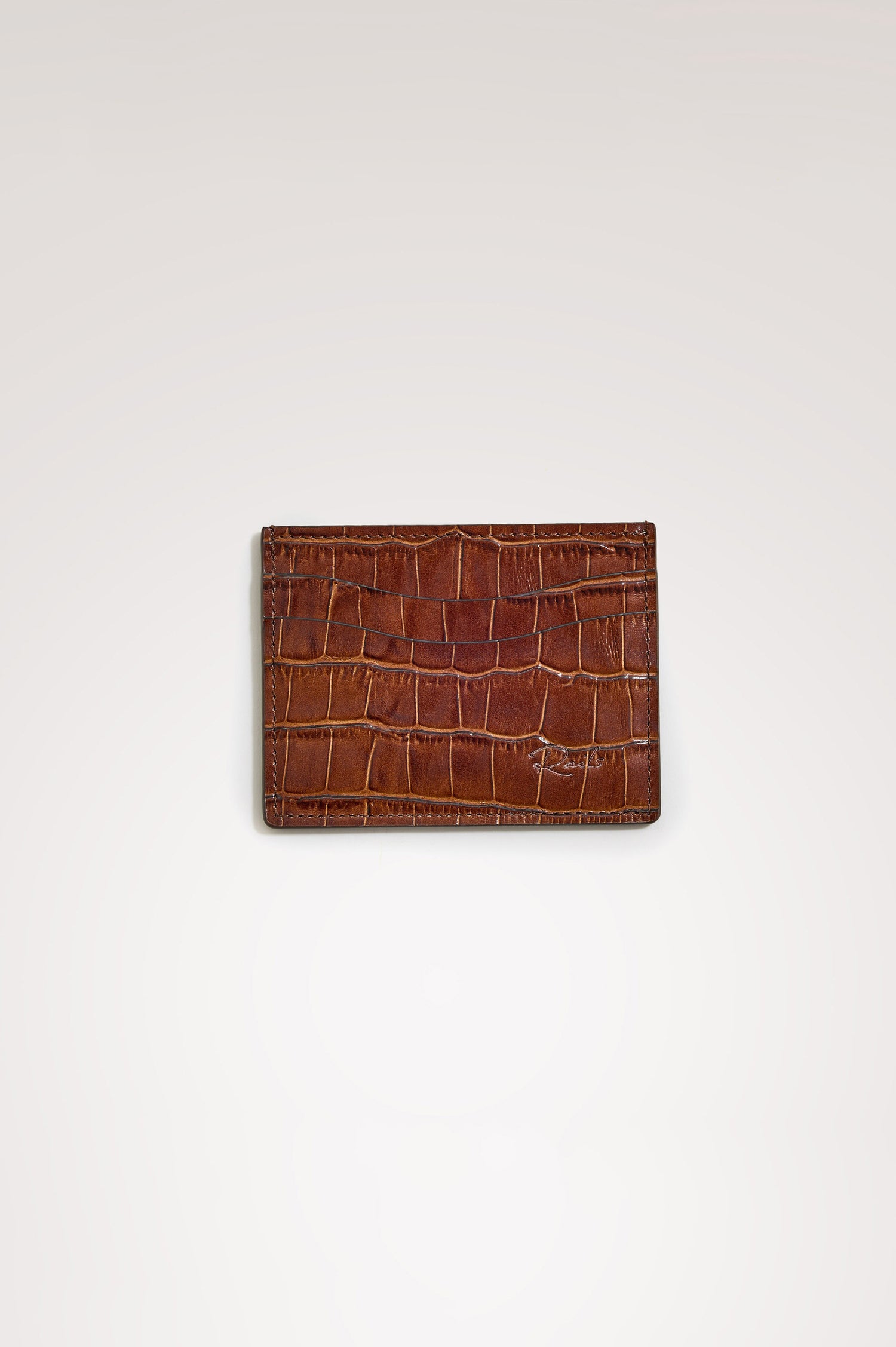 Classic Card Holder in Croc-Embossed Spanish Leather With Top Pocket, Two Front Slip Pockets, and Embossed Rails Logo in Dark Brown Croc Embossed Colorway -