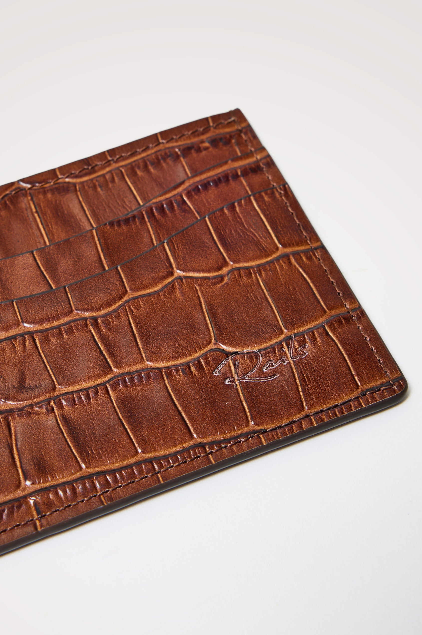 Classic Card Holder in Croc-Embossed Spanish Leather With Top Pocket, Two Front Slip Pockets, and Embossed Rails Logo in Dark Brown Croc Embossed Colorway -