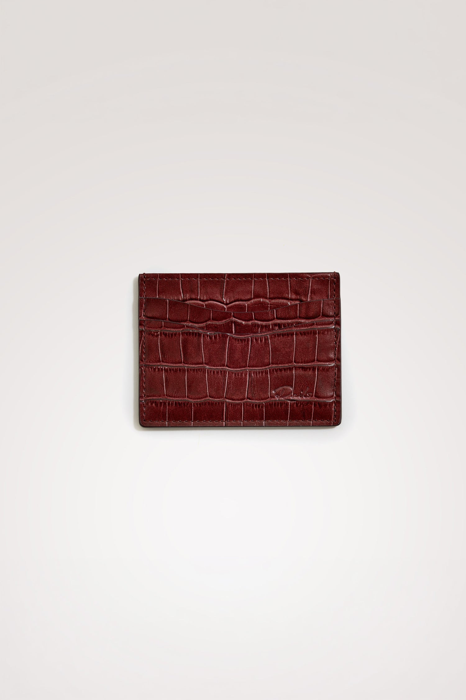 Classic Card Holder in Croc-Embossed Spanish Leather With Top Pocket, Two Front Slip Pockets, and Embossed Rails Logo in Burgundy Croc Embossed Colorway -