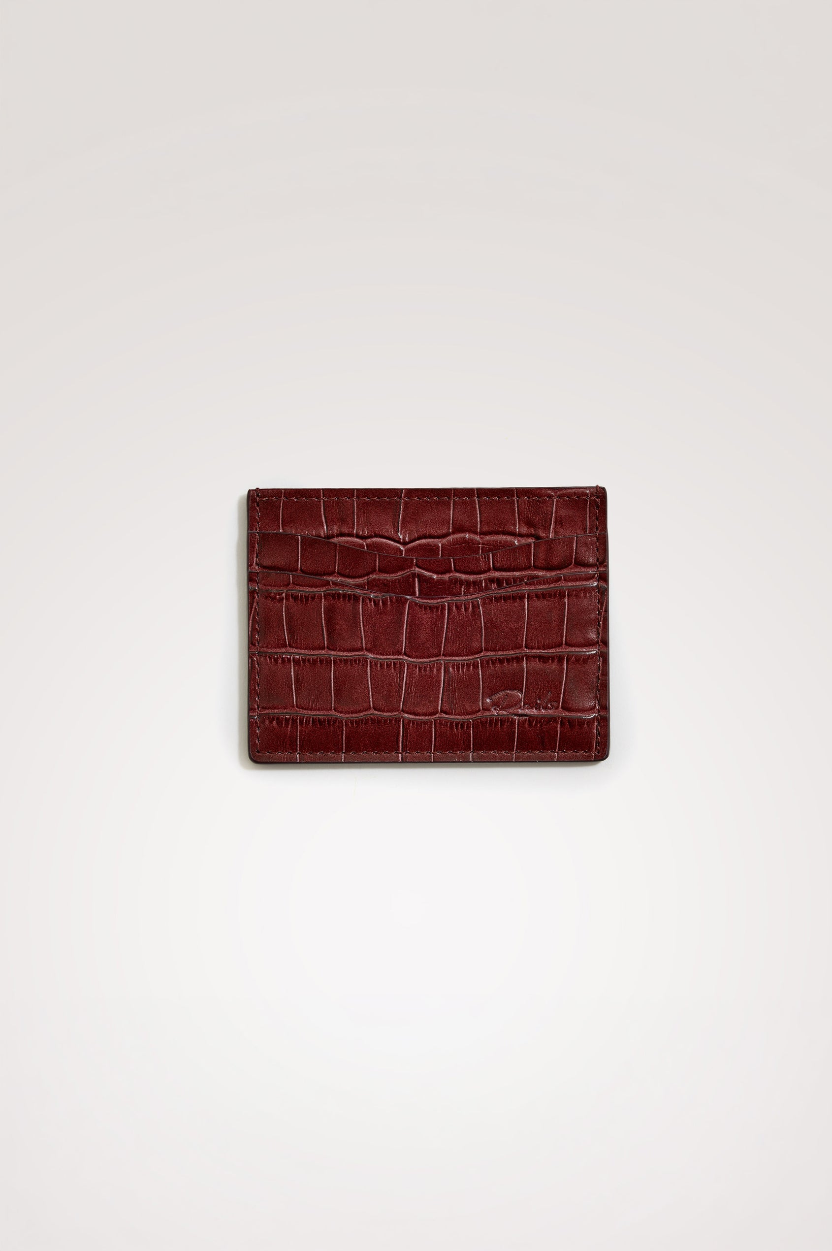 Classic Card Holder in Croc-Embossed Spanish Leather With Top Pocket, Two Front Slip Pockets, and Embossed Rails Logo in Burgundy Croc Embossed Colorway -