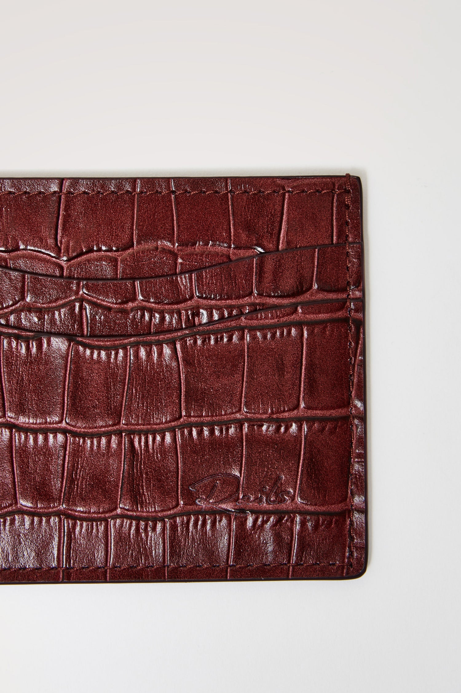 Classic Card Holder in Croc-Embossed Spanish Leather With Top Pocket, Two Front Slip Pockets, and Embossed Rails Logo in Burgundy Croc Embossed Colorway -