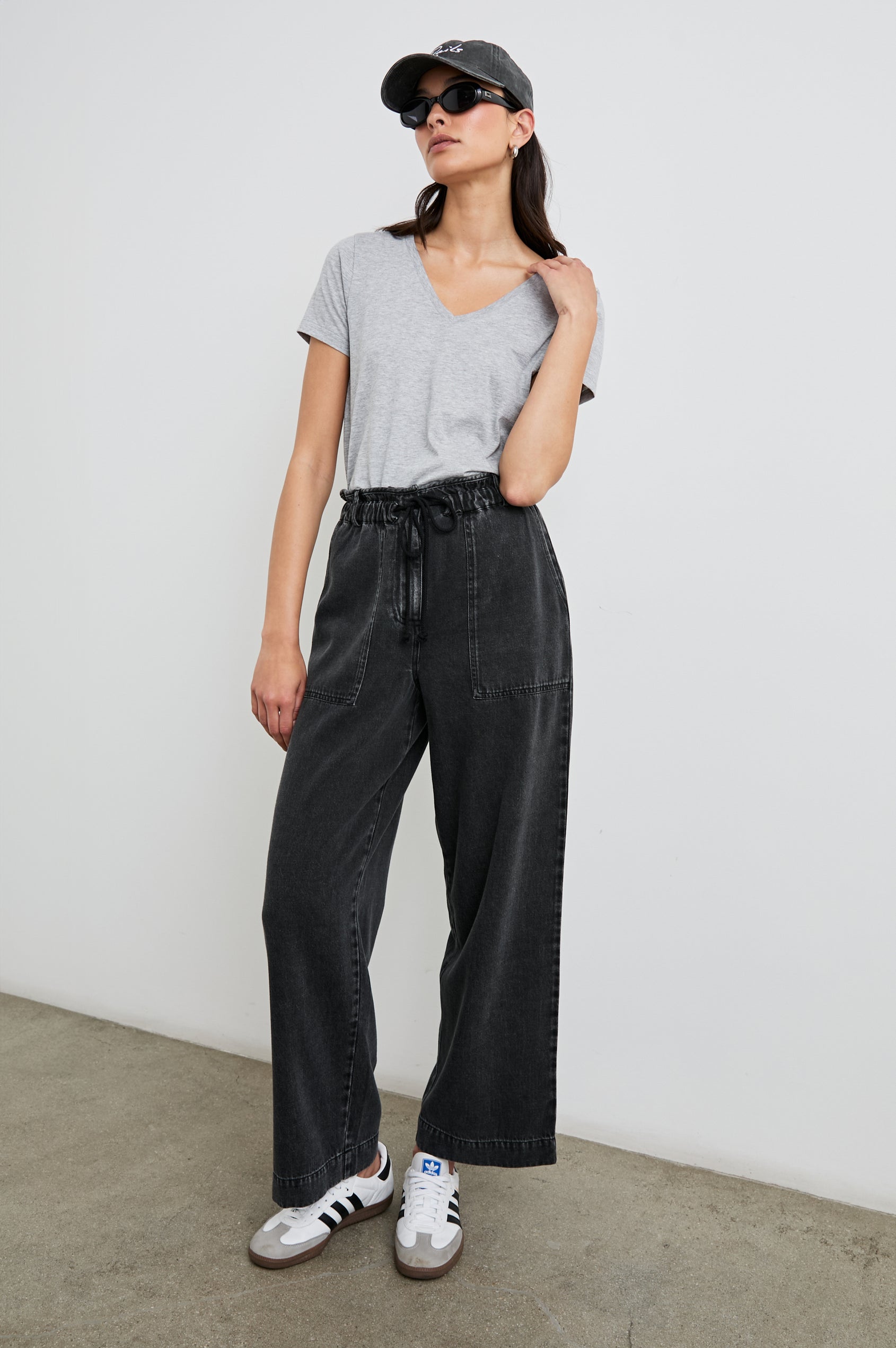 Classic Short Sleeve V Neck T-Shirt in Heather Grey Colorway - Front Tucked Full Body View Featured on Model