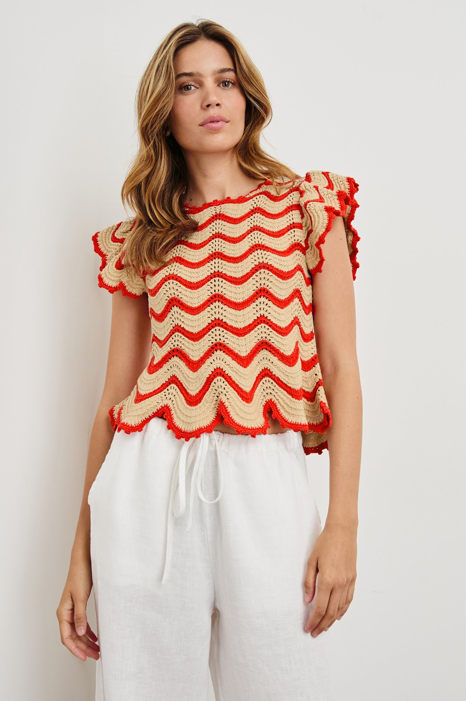 Coen Crochet Knit Short-Sleeve Top with Flared Sleeves and a Back Keyhole Tie in Cherry Oat Stripe Colorway, Horizontal Wavy Stripes - Front View Featured on Model