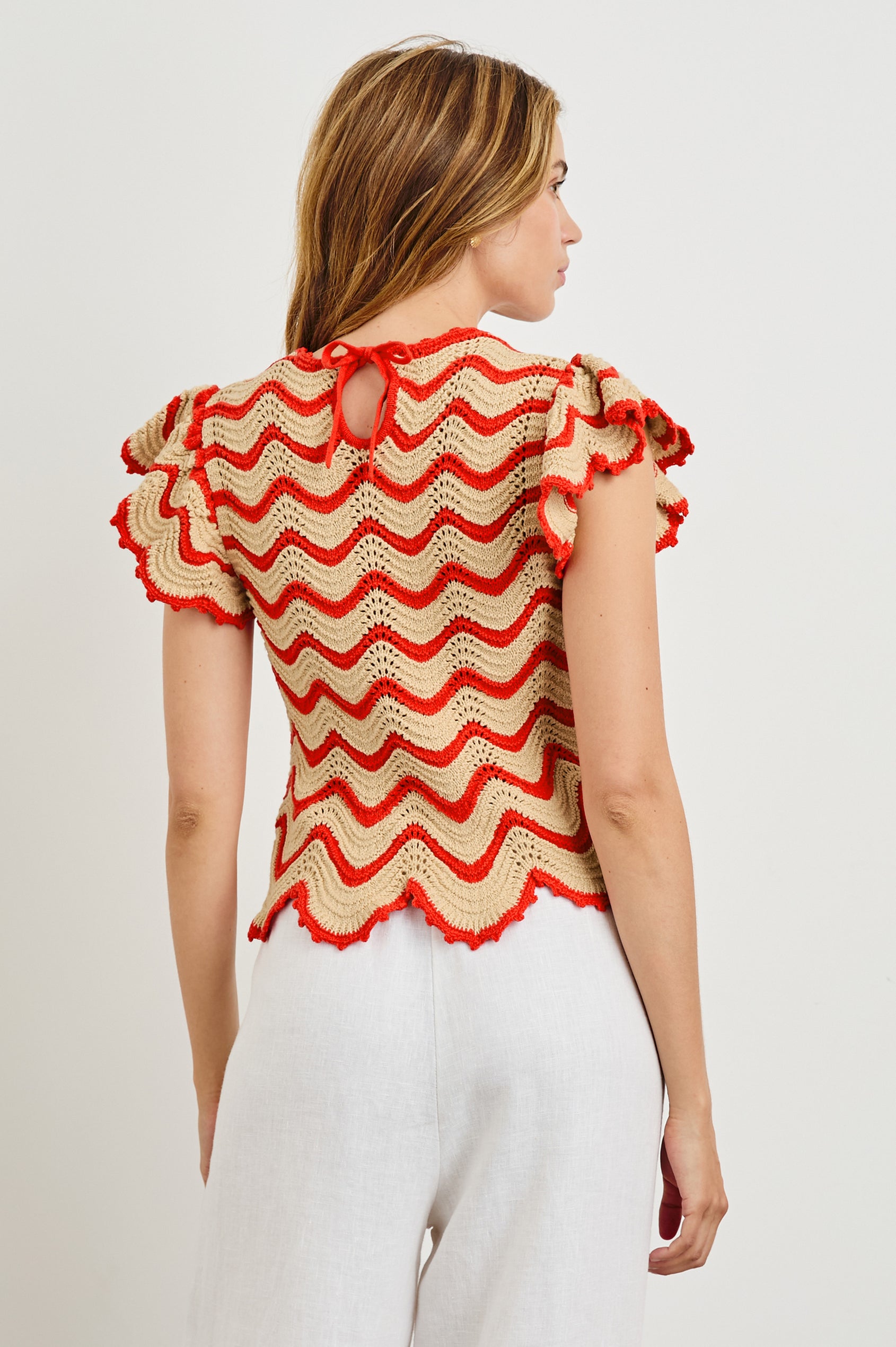 Coen Crochet Knit Short-Sleeve Top with Flared Sleeves and a Back Keyhole Tie in Cherry Oat Stripe Colorway, Horizontal Wavy Stripes - Back View Featured on Model