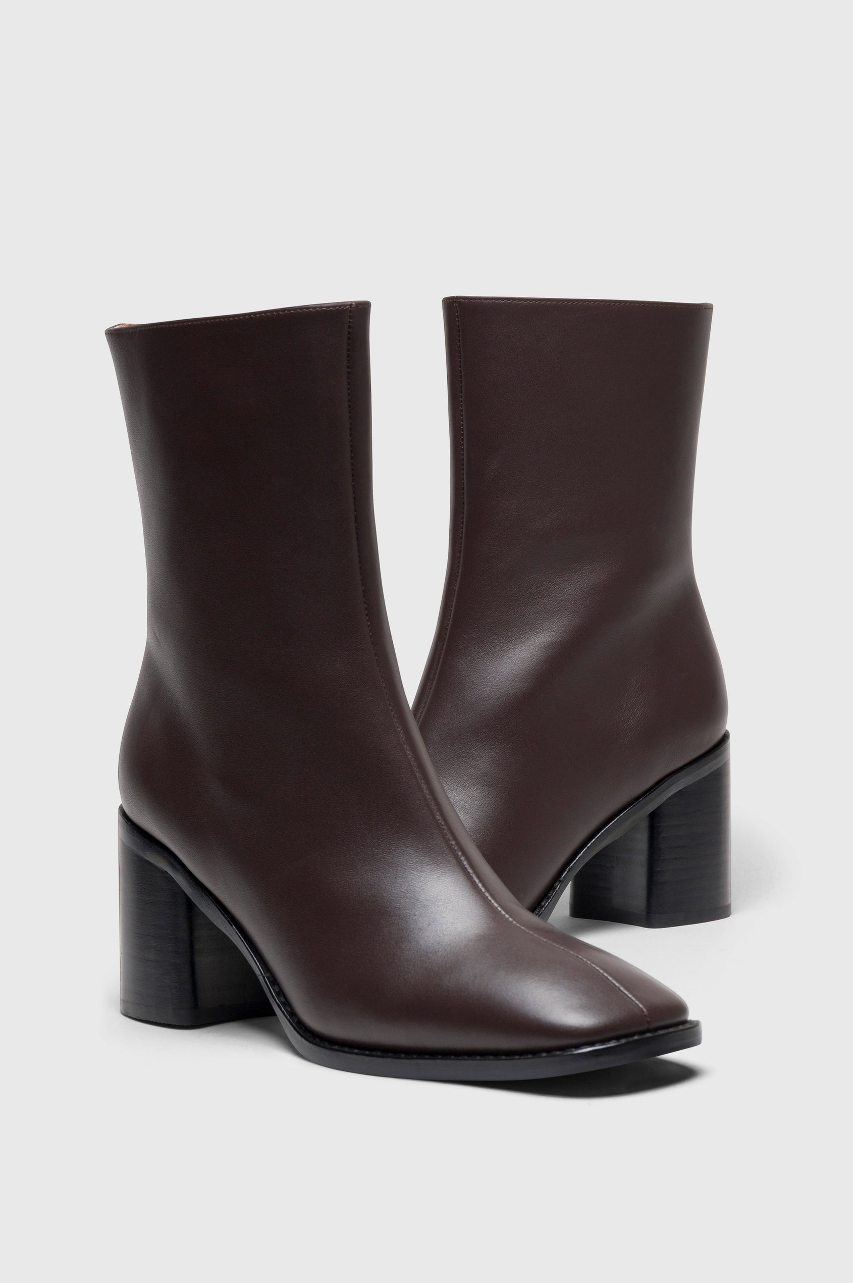 Contour mid length square toe boot with a block heel and side zipper in dark brown Espresso colorway - side view of shoe pair