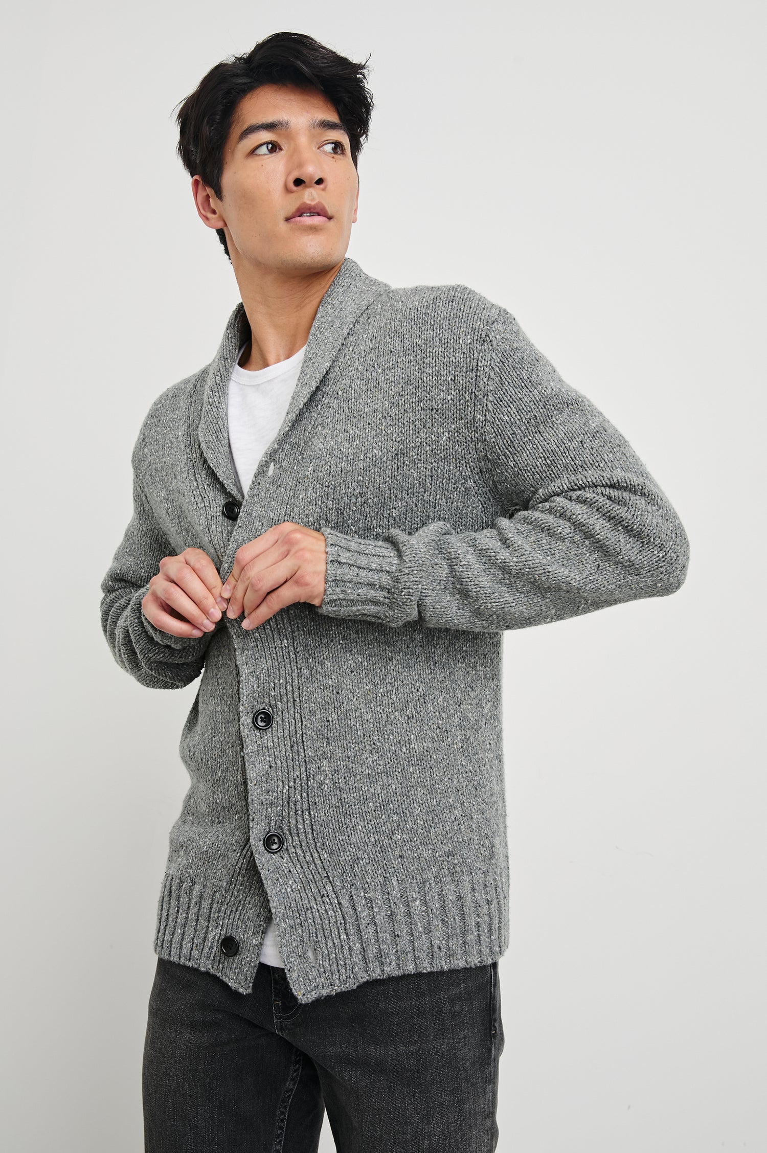 Corden Long-Sleeve Cardigan with Button Closure, a Shawl Collar and Ribbed Trim in Monochromatic Speckle Colorway, white and Black Speckles on Grey - Front View Featured on Model