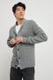 Corden Long-Sleeve Cardigan with Button Closure, a Shawl Collar and Ribbed Trim in Monochromatic Speckle Colorway, white and Black Speckles on Grey - Front View Featured on Model