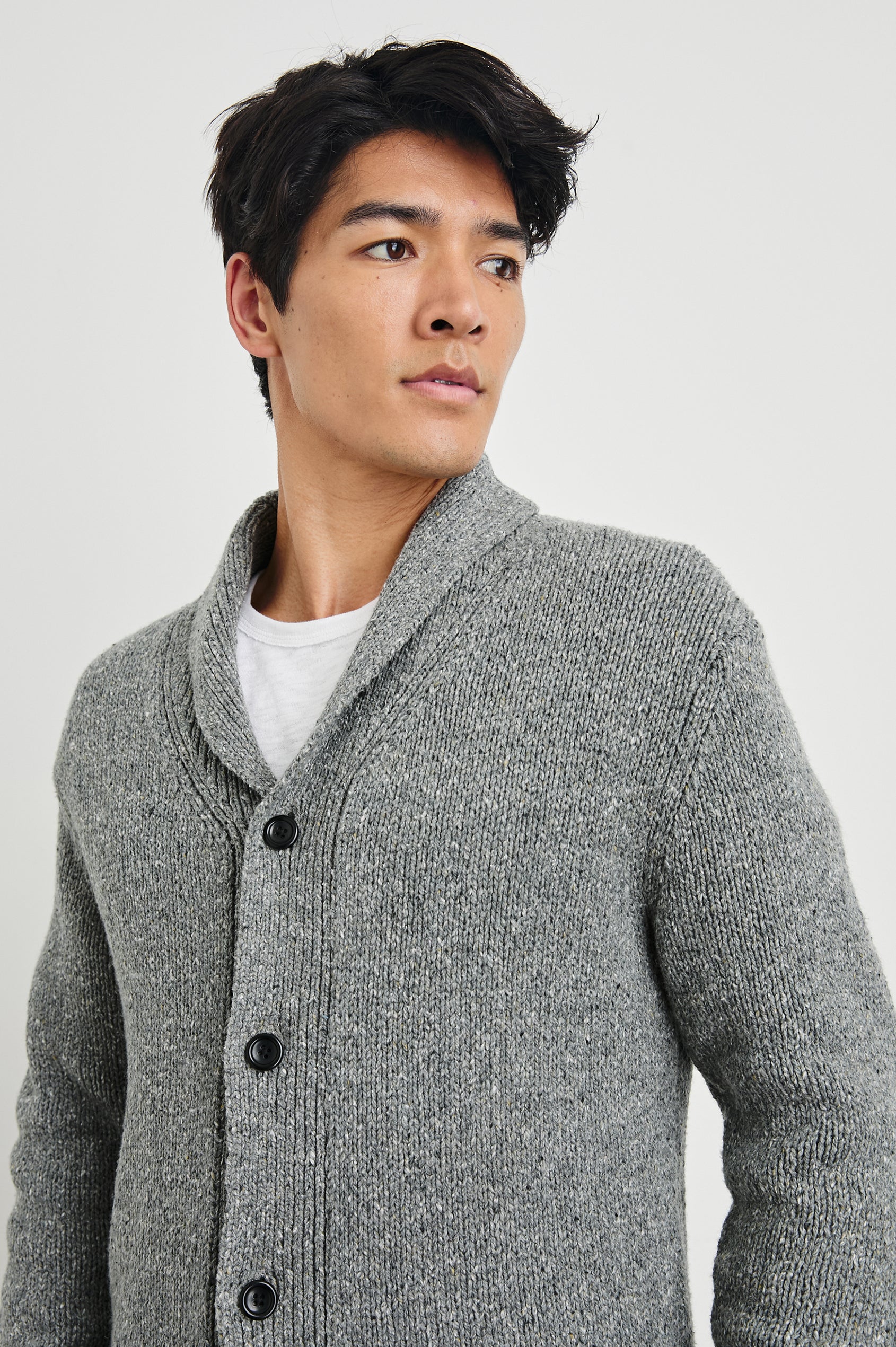 Corden Long-Sleeve Cardigan with Button Closure, a Shawl Collar and Ribbed Trim in Monochromatic Speckle Colorway, white and Black Speckles on Grey - Front View Featured on Model