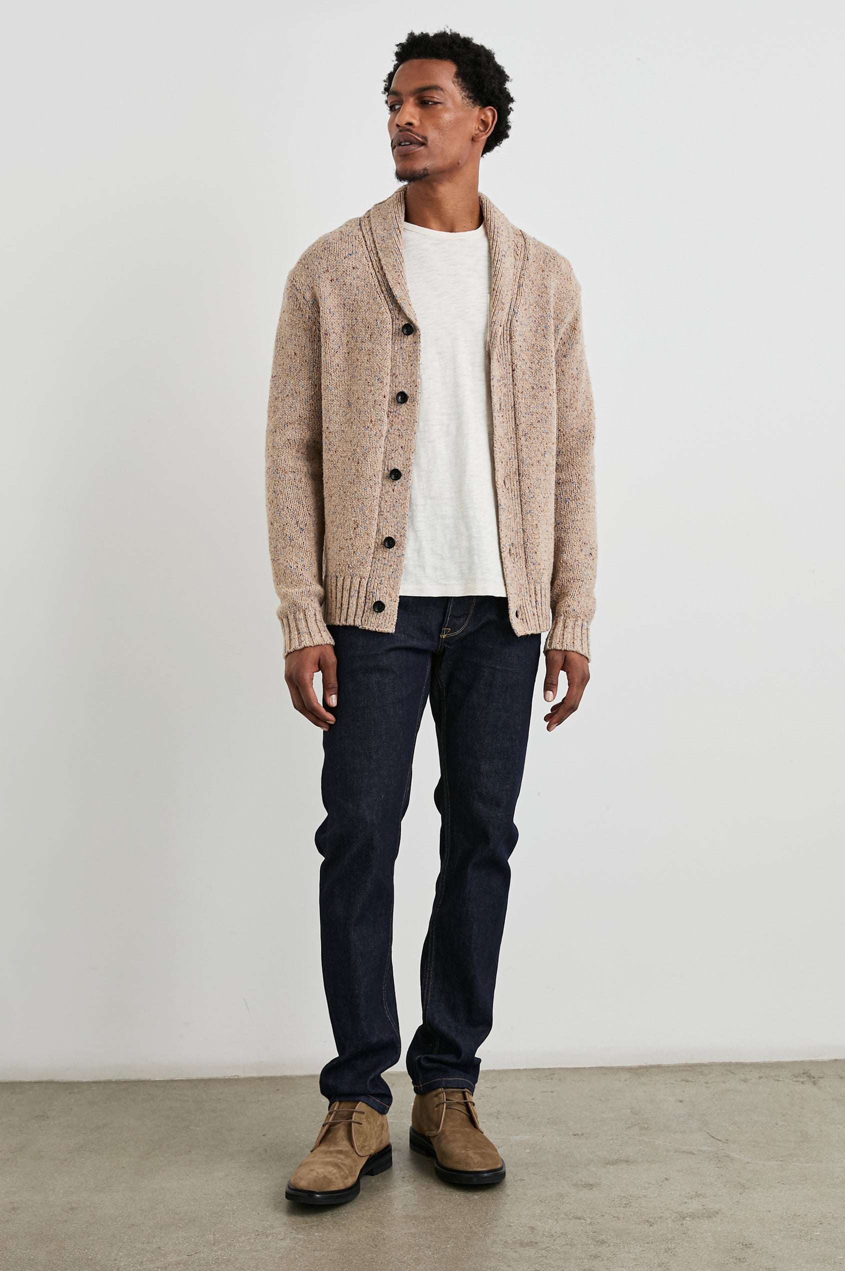 Corden Long-Sleeve Cardigan with Button Closure, a Shawl Collar and Ribbed Trim in Oatmeal Speckle Colorway - Front Full Body View Featured on Model