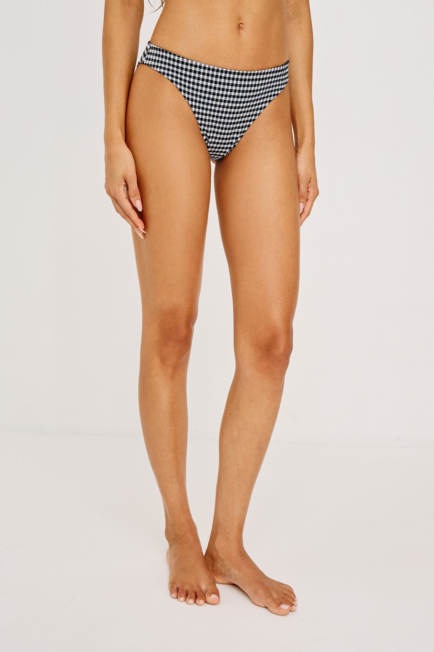Corsica Bikini Bottom With Fixed Side Straps and Cheeky Rear Coverage in Black White Gingham Colorway - Lower Body Front View Featured on Model