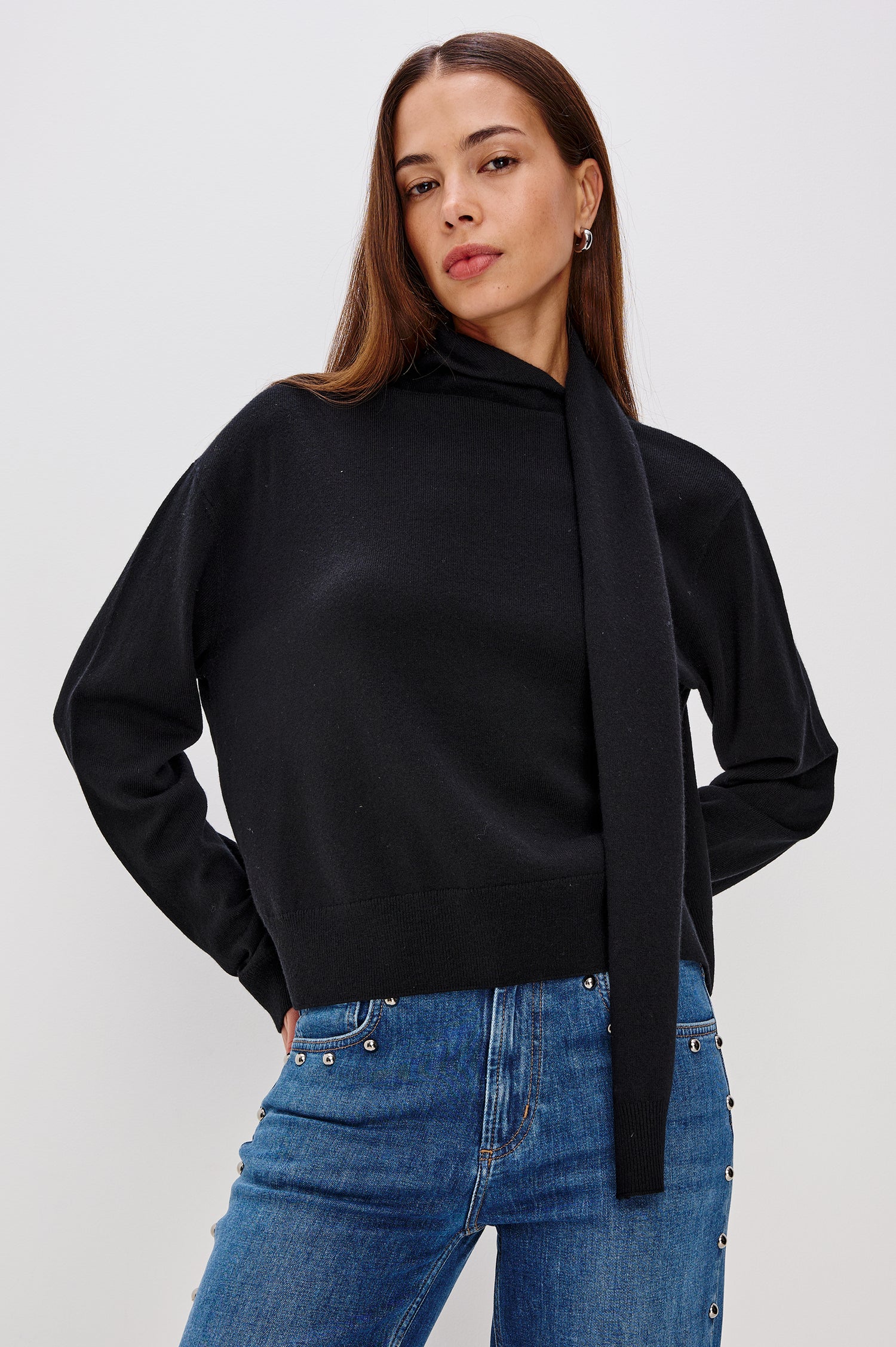 Cortina Wool Cashmere Blend Sweater with an Attached Self-Tie Scarf, Relaxed Fit With Dropped Shoulders, Long Sleeves, and Ribbed Trim in Black Colorway - Upper Body Front View Featured on Model