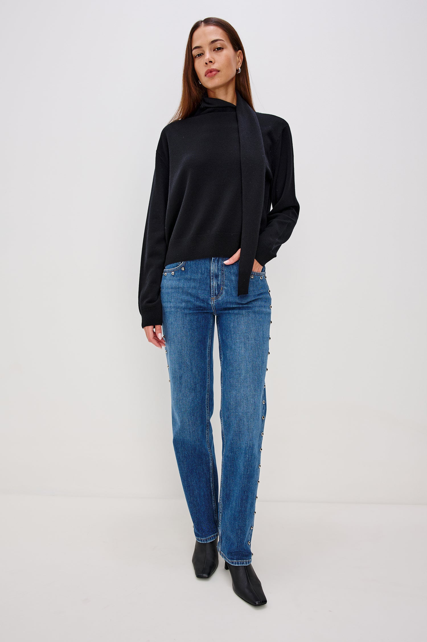 Cortina Wool Cashmere Blend Sweater with an Attached Self-Tie Scarf, Relaxed Fit With Dropped Shoulders, Long Sleeves, and Ribbed Trim in Black Colorway - Full Body Front View Featured on Model