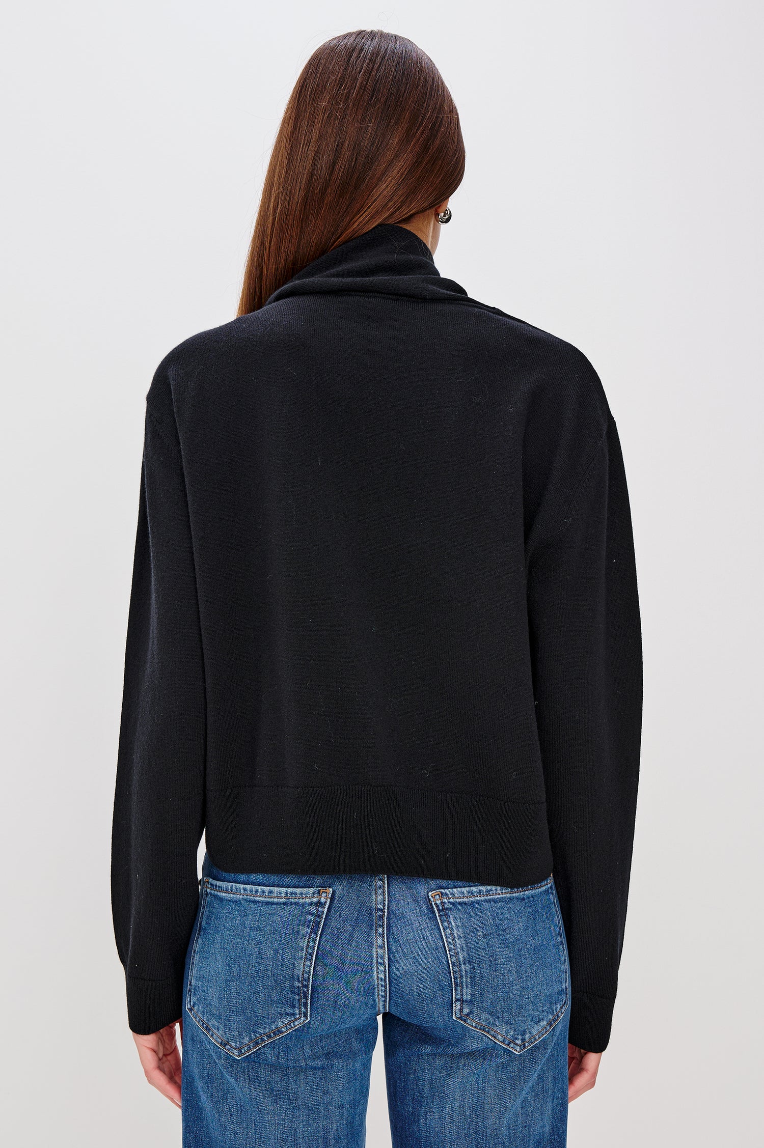 Cortina Wool Cashmere Blend Sweater with an Attached Self-Tie Scarf, Relaxed Fit With Dropped Shoulders, Long Sleeves, and Ribbed Trim in Black Colorway - Upper Body Back View Featured on Model