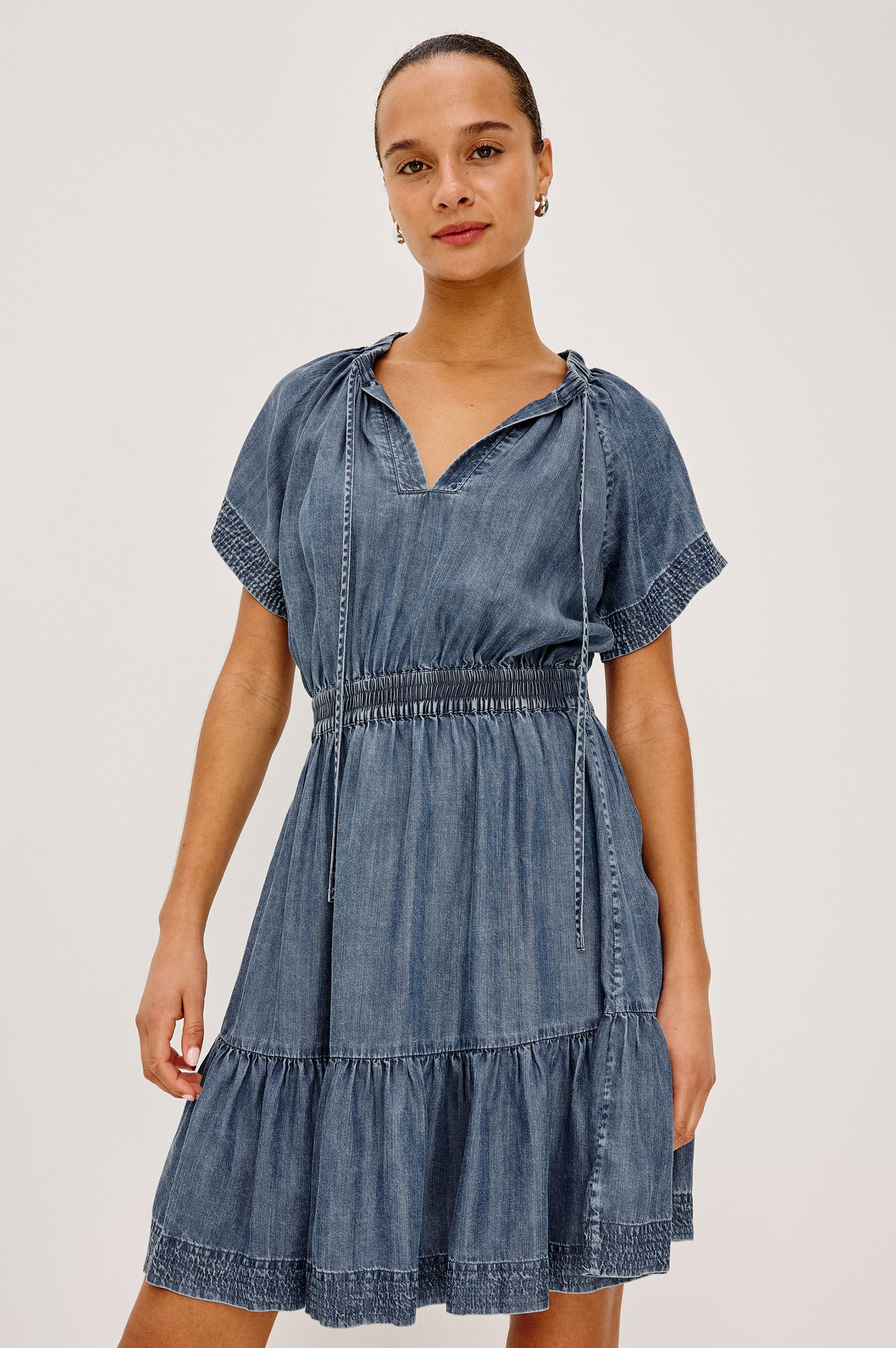 Corvera Mini Dress in TENCEL™ With Split V-Neckline, Short Raglan Flutter Sleeves, Elastic Waist, Tiered Skirt, and Loose, Relaxed Fit in Blue Ridge Colorway - Upper Body Front View Featured on Model