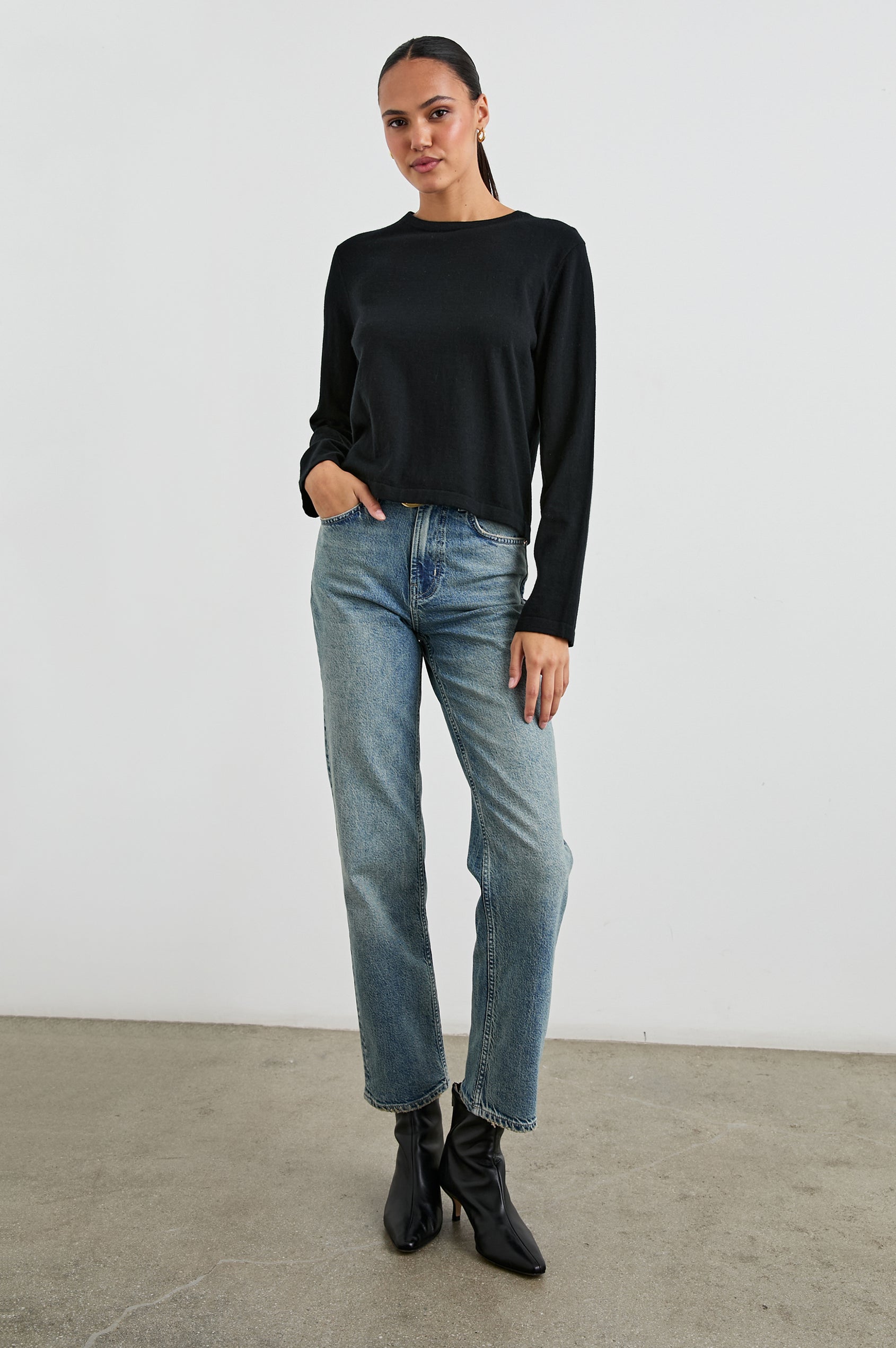 Cotton Cashmere Long Sleeve Tee with Crew Neckline in Black Colorway - Front Tucked Full Body View Featured On Model