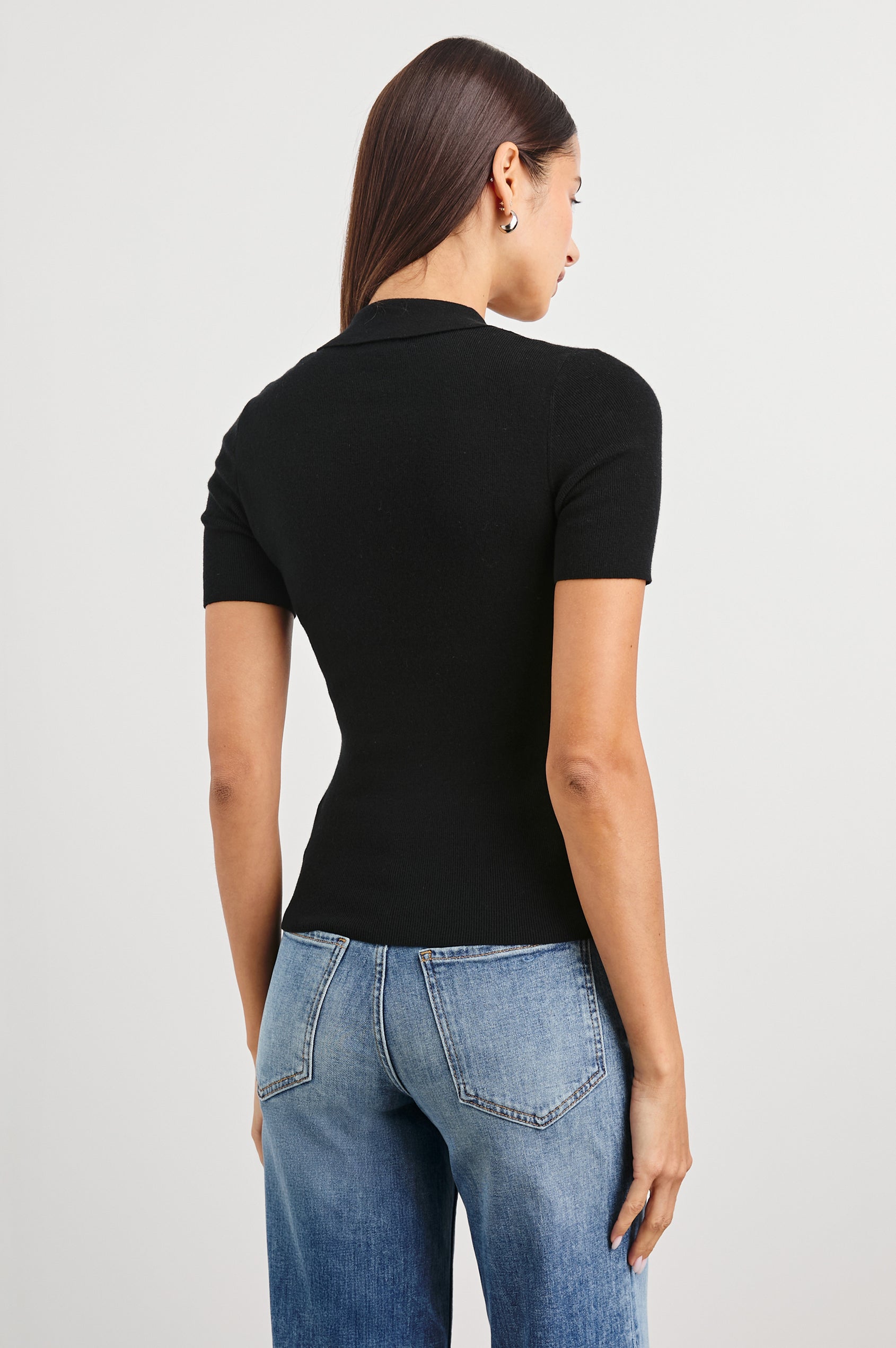 Court Polo Ribbed Knit Short Sleeve Top In Colorway Black - Back View Featured On Model