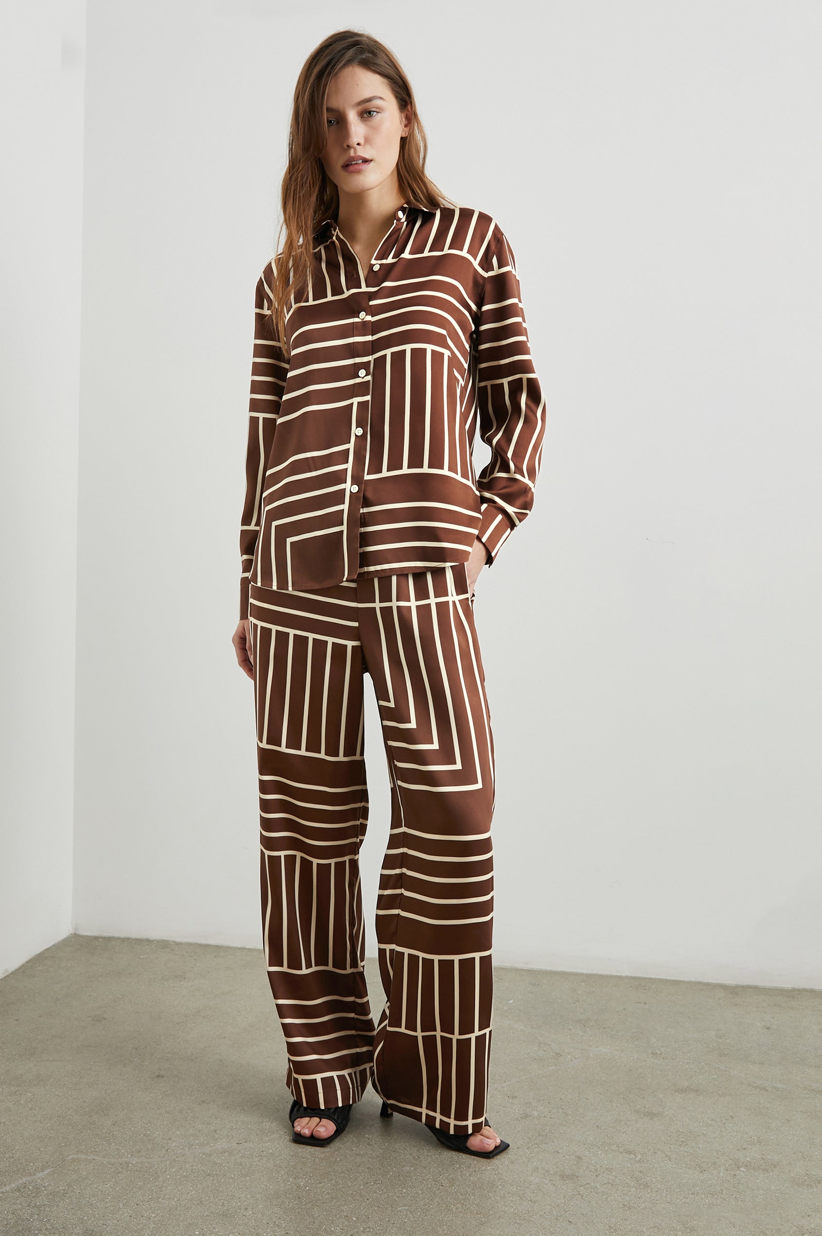 Damini Pants with a Drawstring Waist and Two Front Pockets in Brown Line Art Colorway, white lines on brown - Front Full Body View Featured on Model