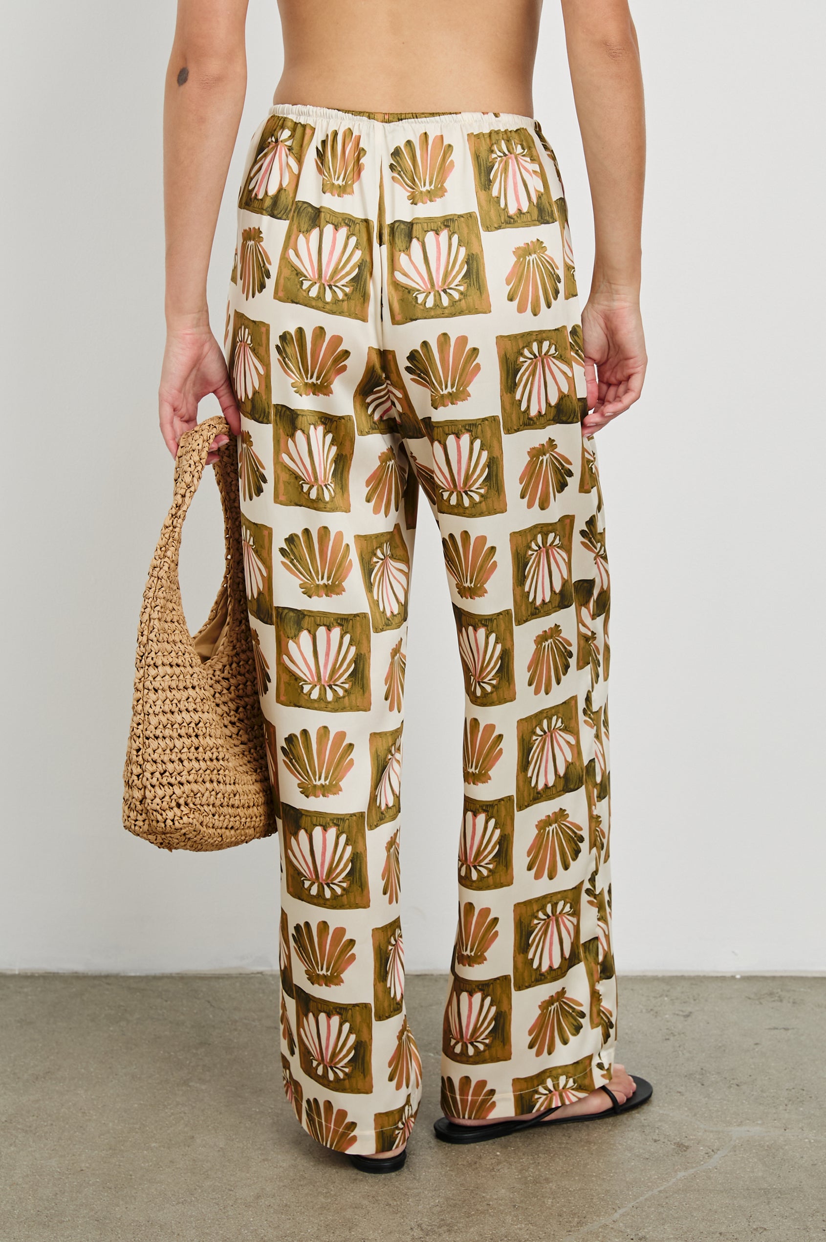 Damani Wide Leg Drawstring Pant with Side Pockets in Checkered Shells Colorway. Back View Shown on Model.