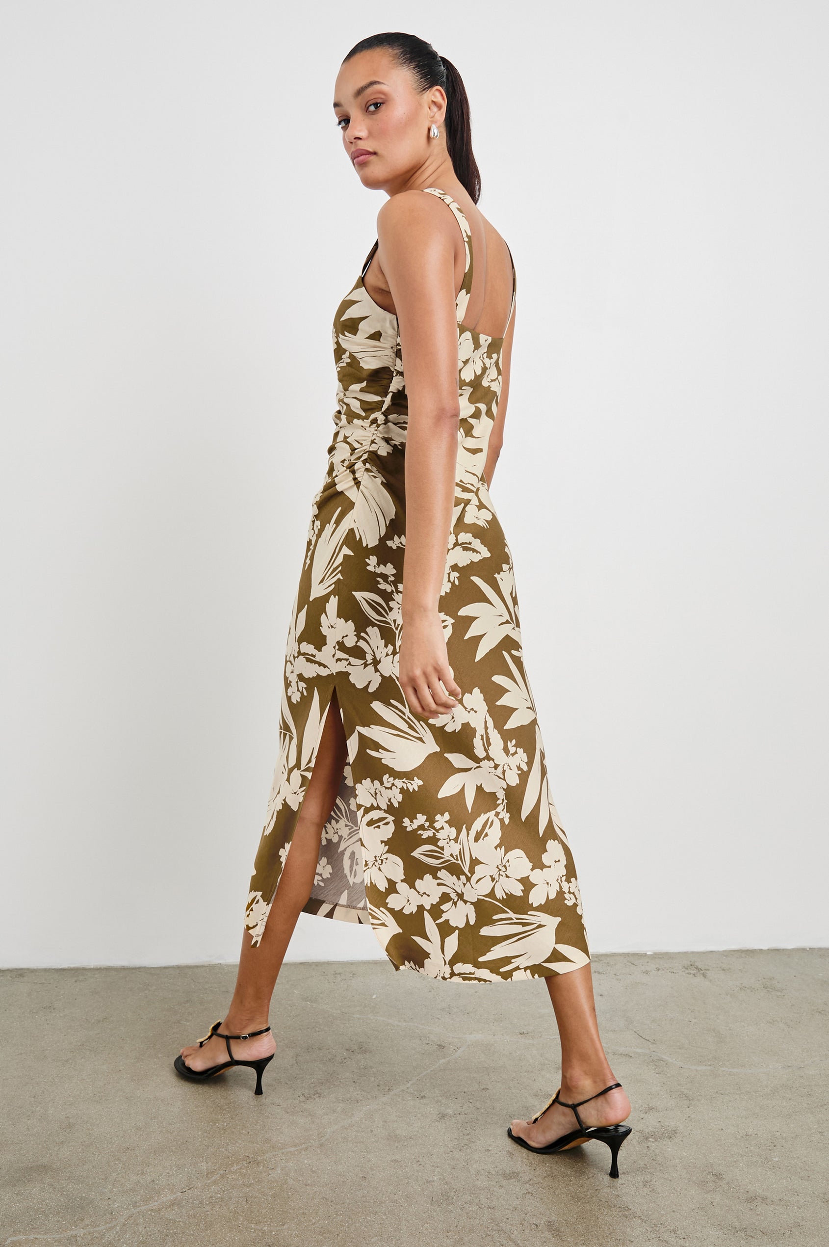 Damaris Midi Tank Dress with a Square Neck Opening, Side Seam Ruching and a Slit on Left Side Hem in Olive Tropic Colorway. Full Body Back View Shown on Model.