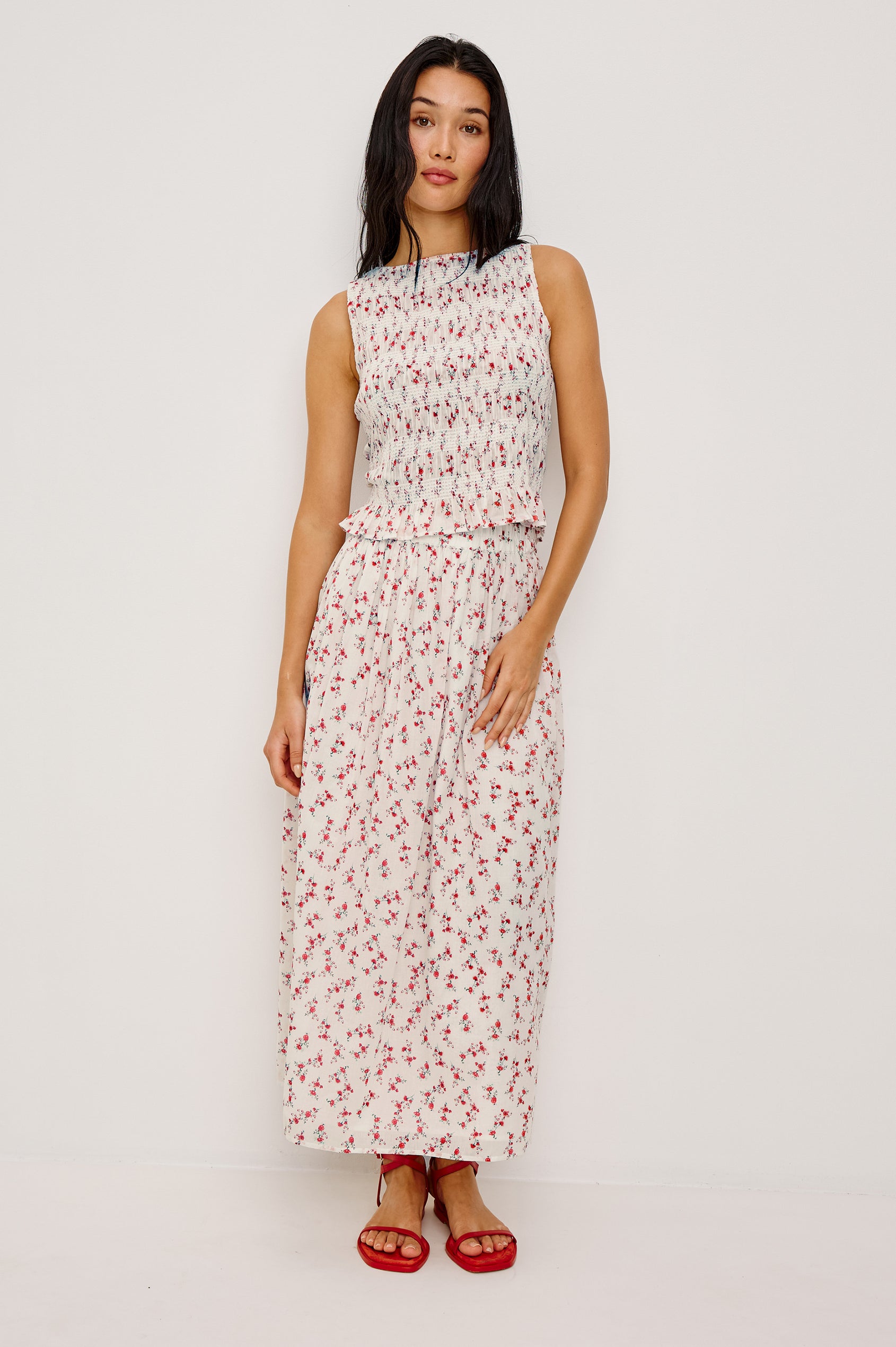 Dax A-Line Maxi Skirt With Grid and Floral Cutwork Embroidery Elastic Waistband and is Fully Lined in Berry Hibiscus Floral Embroidery Colorway - Full Body Front View Featured on Model