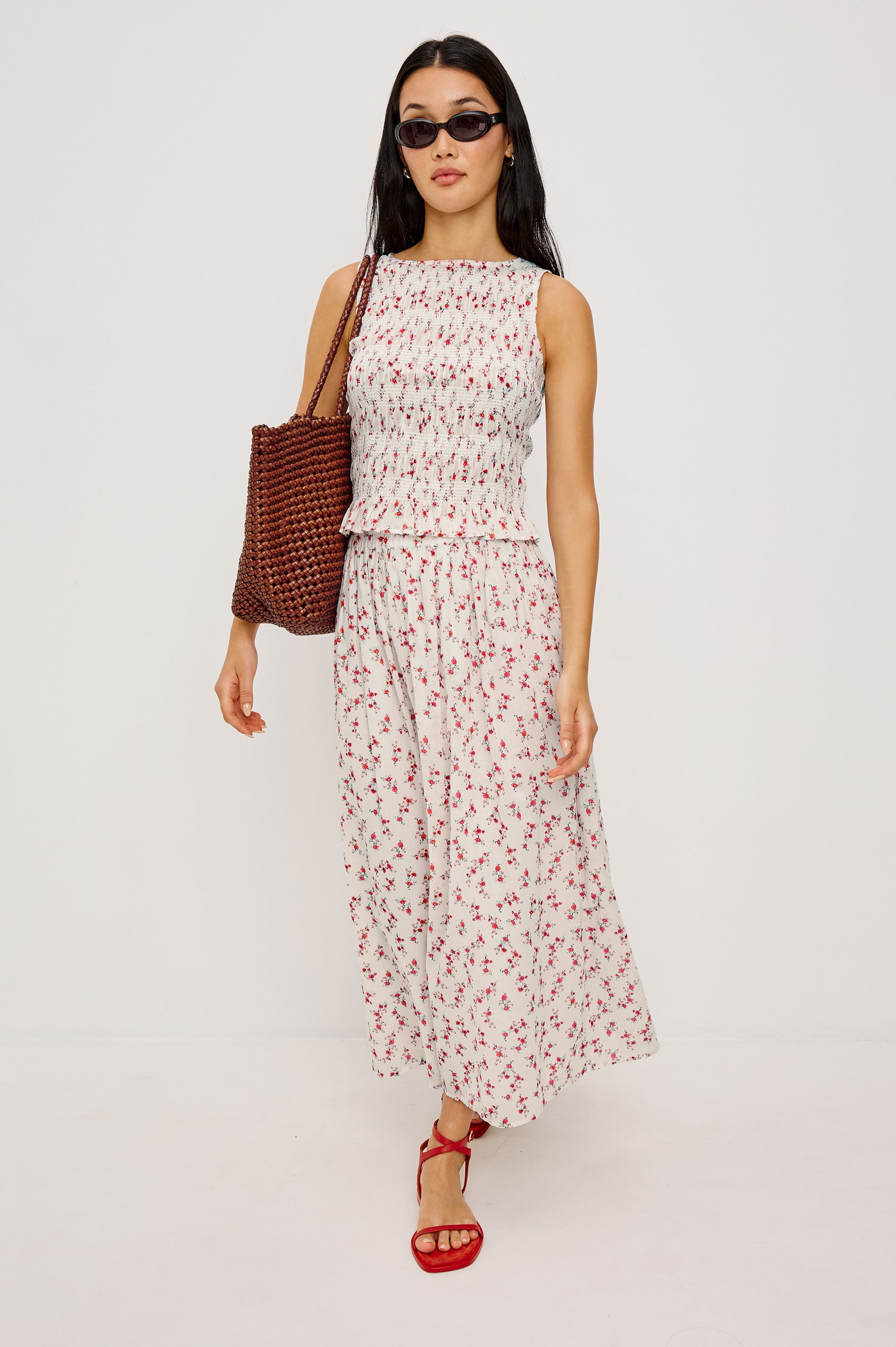 Dax A-Line Maxi Skirt With Grid and Floral Cutwork Embroidery Elastic Waistband and is Fully Lined in Berry Hibiscus Floral Embroidery Colorway - Full Body Front View Featured on Model