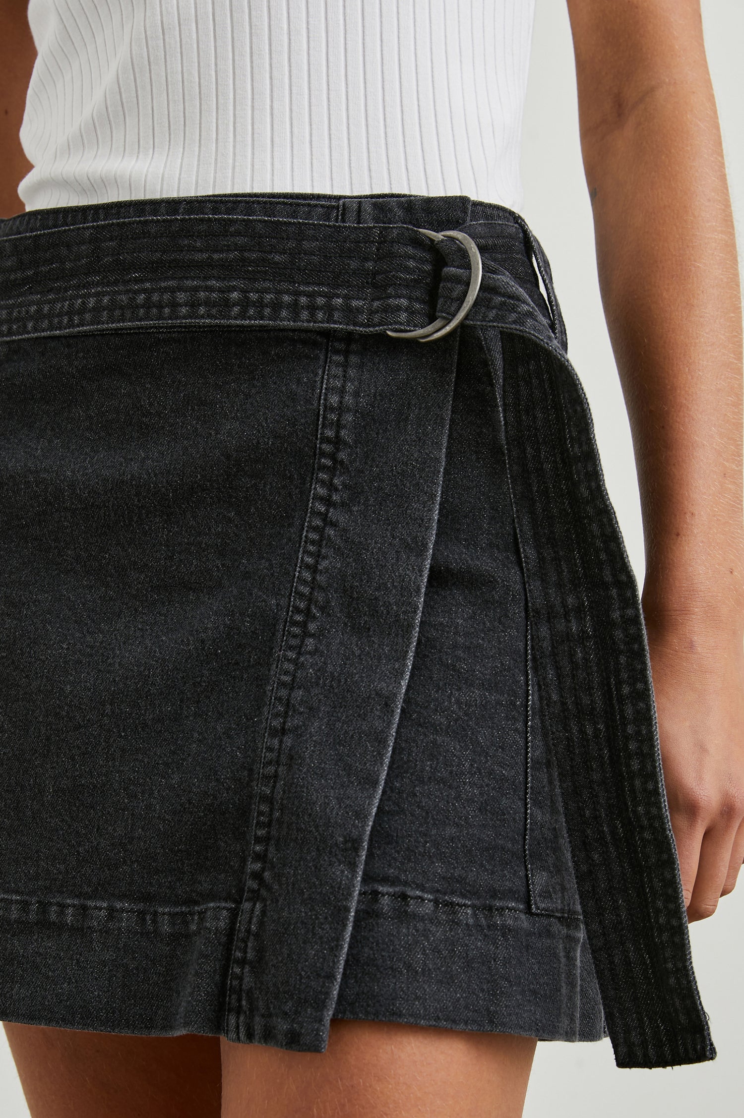 Deanna Mini Wrap Skirt with Fabric Belt and Two Side Pockets in Black Pearl Colorway - Front View Featured on Model