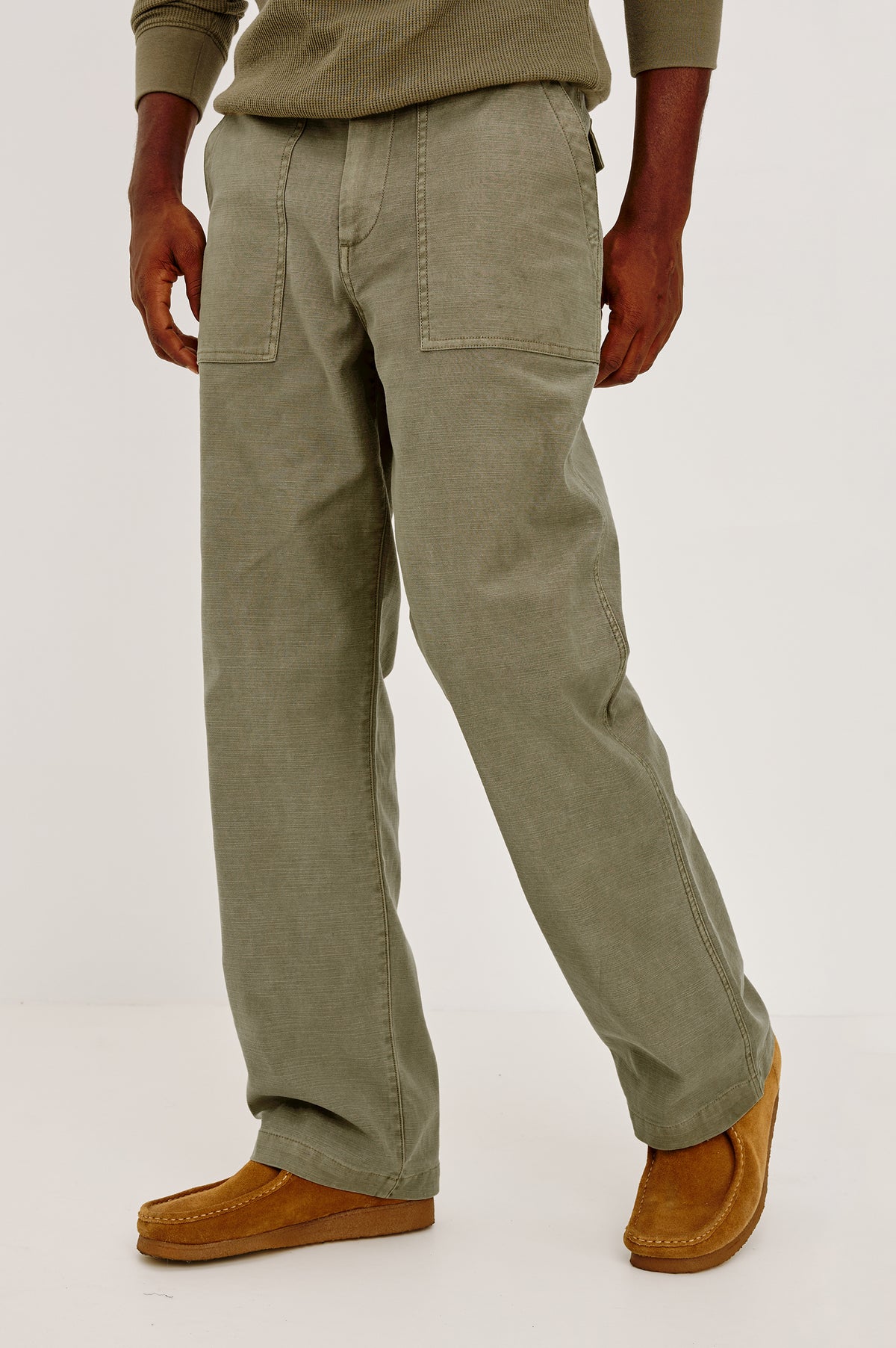 Decker Relaxed Straight Leg Workwear Pant in Stretch Cotton With Lived-In Wash, Zip Fly, and Side and Back Buttoned-Flap Pockets in Terra Colorway - Lower Body Front View Featured on Model