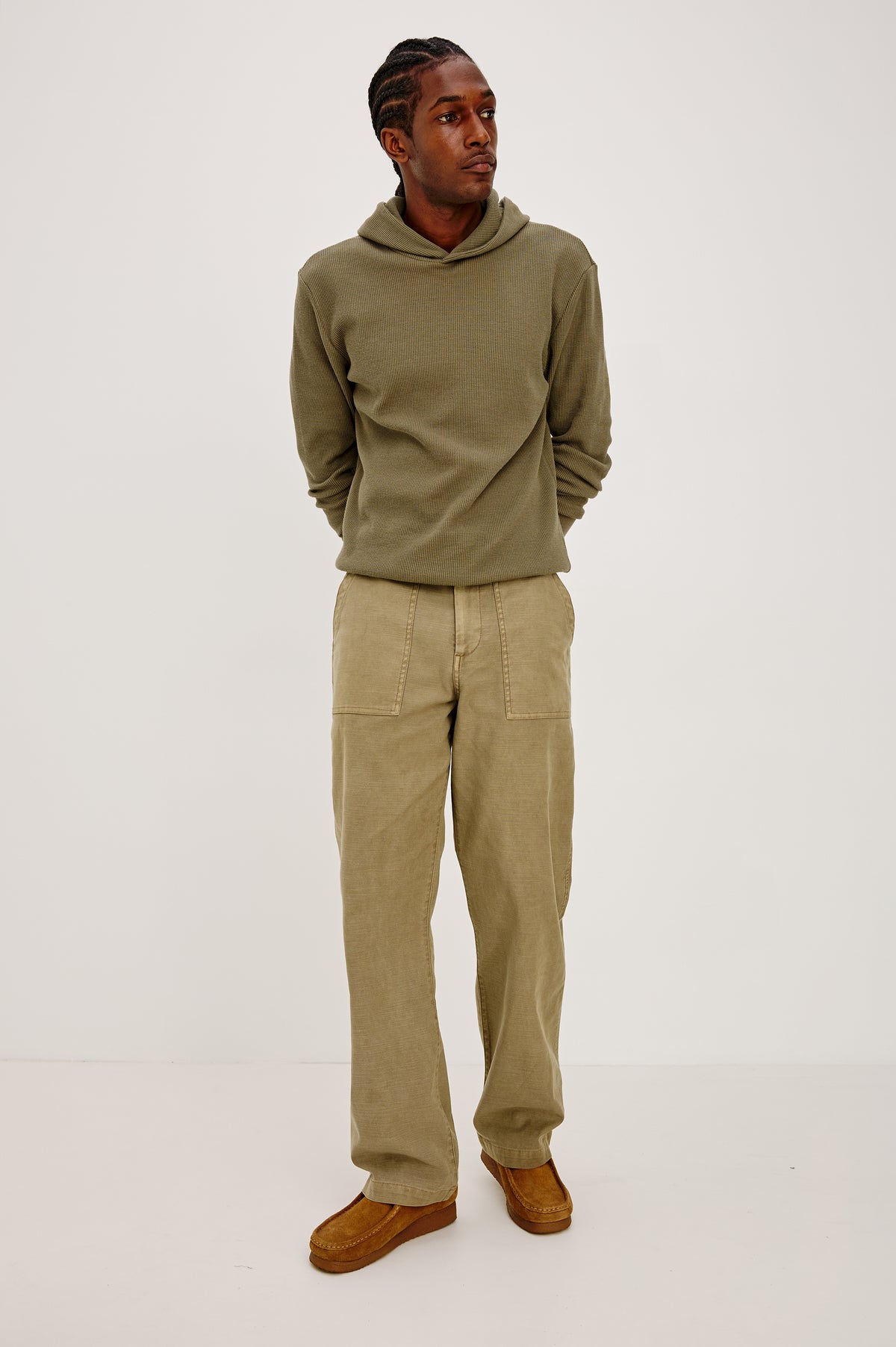 Decker Relaxed Straight Leg Workwear Pant in Stretch Cotton With Lived-In Wash, Zip Fly, and Side and Back Buttoned-Flap Pockets in Terra Colorway - Full Body Close Up Front View Featured on Model