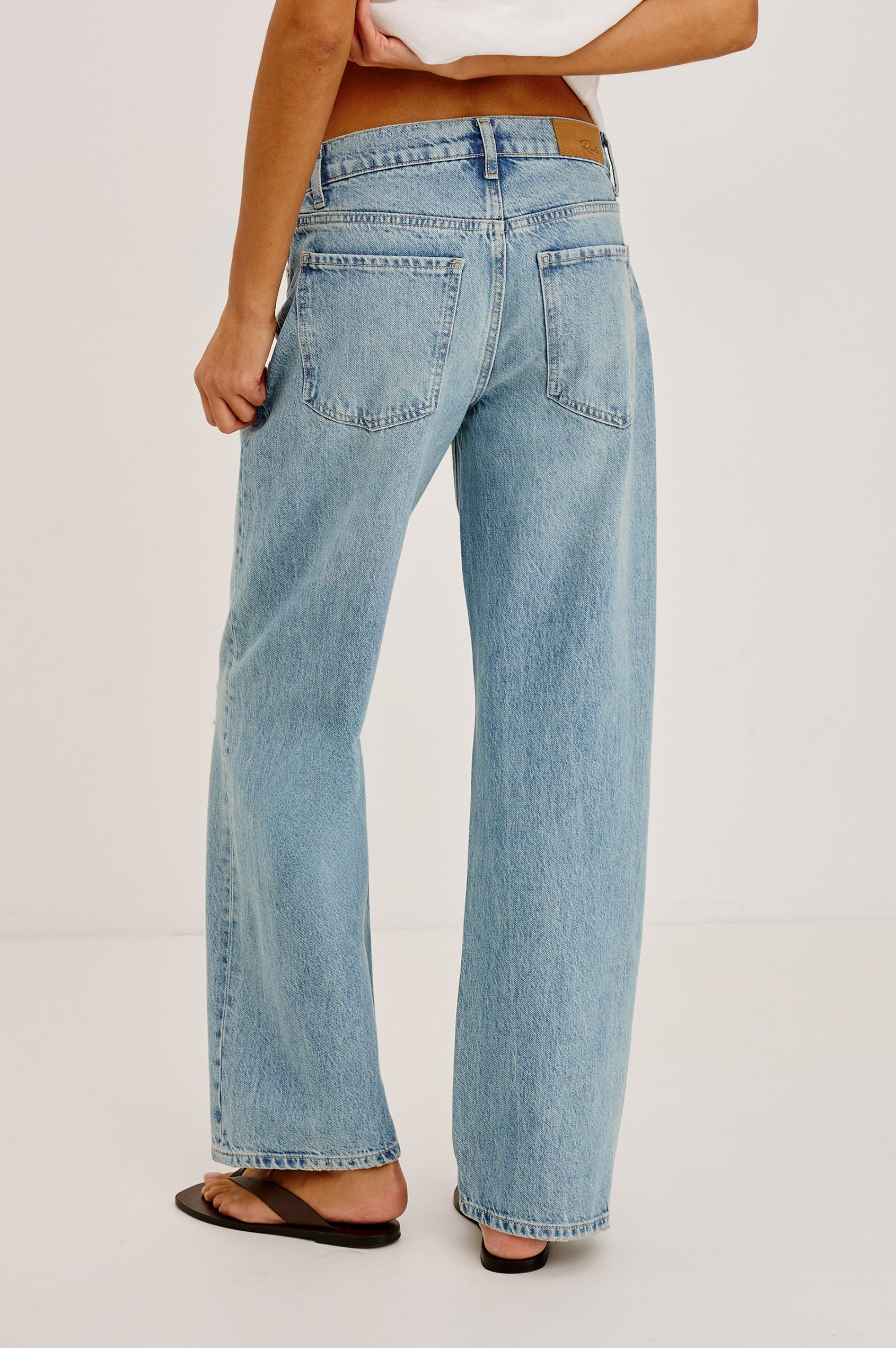 Del Mar Boyfriend Jean in TENCEL™ With Wide, Relaxed Legs, Distressed Knee and Detailing, and 5-Pocket Vintage-Inspired Design, and Button Fly in Heritage Desconstructed Colorway - Lower Body Back View Featured on Model