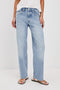 Del Mar low slung baggy boyfriend 5-pocket jean in light wash Jasper - front view on model, hand on waistline