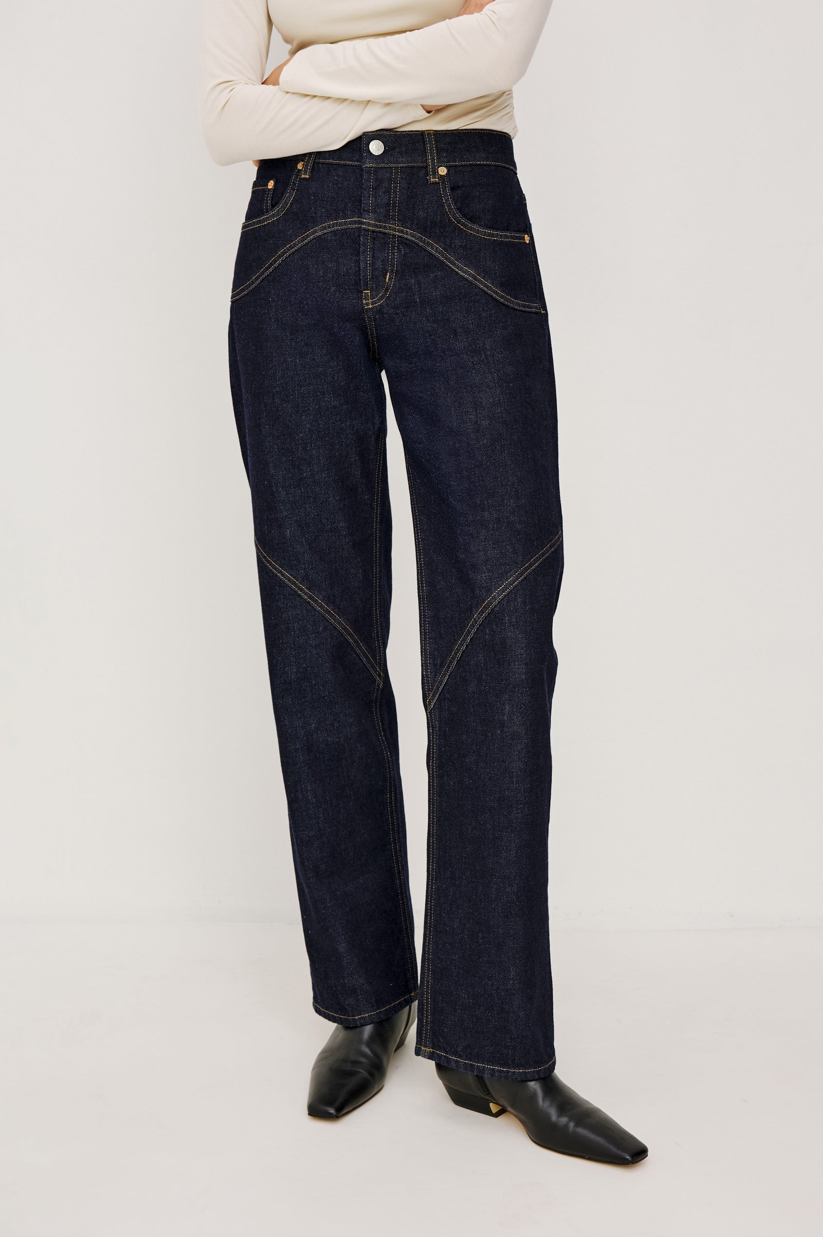 Del Mar Low-Rise Wide Straight Leg Jean in Rigid Dark Wash Denim With Wide Straight Legs, Saddle Seam Detailing, in Onyx Colorway - Lower Body Front View Featured on Model