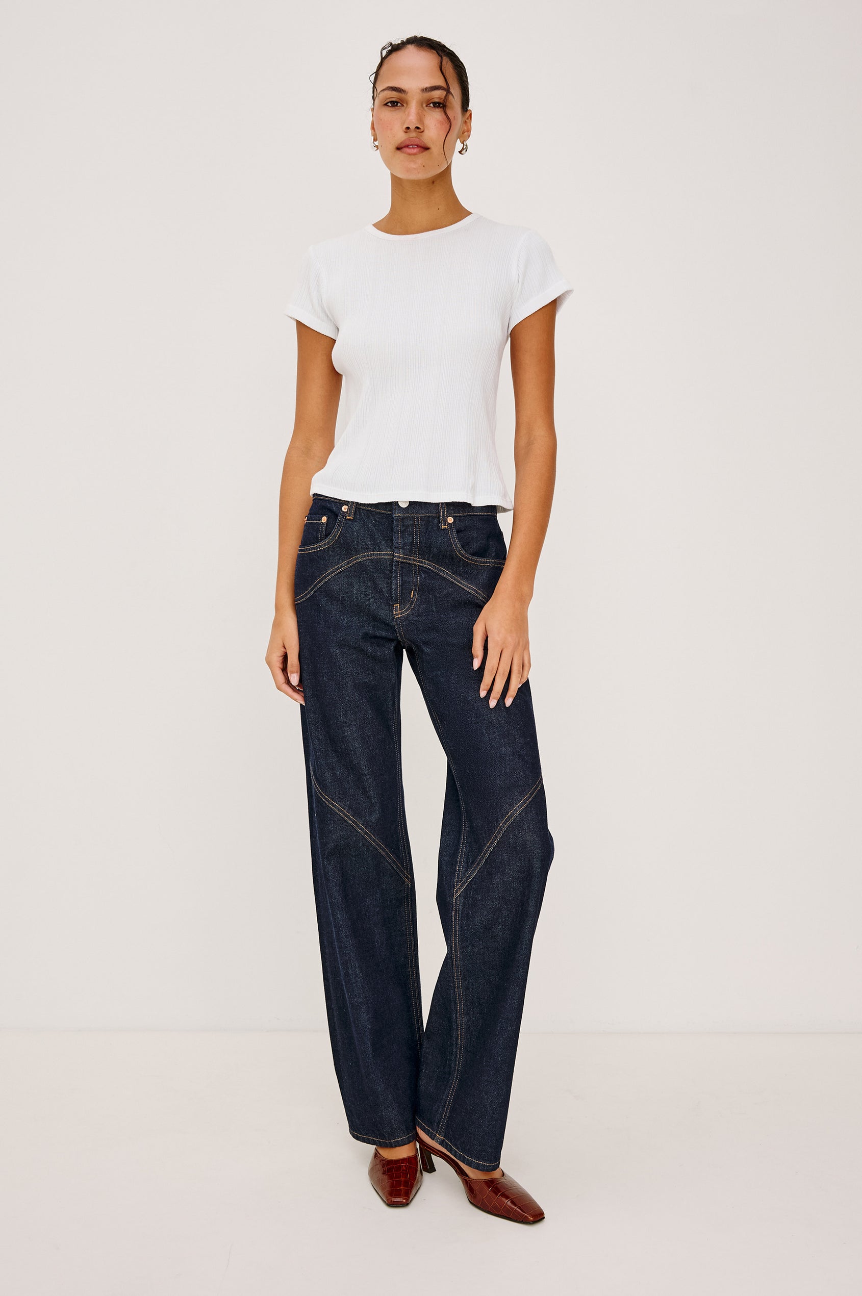 Del Mar Low-Rise Wide Straight Leg Jean in Rigid Dark Wash Denim With Wide Straight Legs, Saddle Seam Detailing, in Onyx Colorway - Full body front View Featured on Model