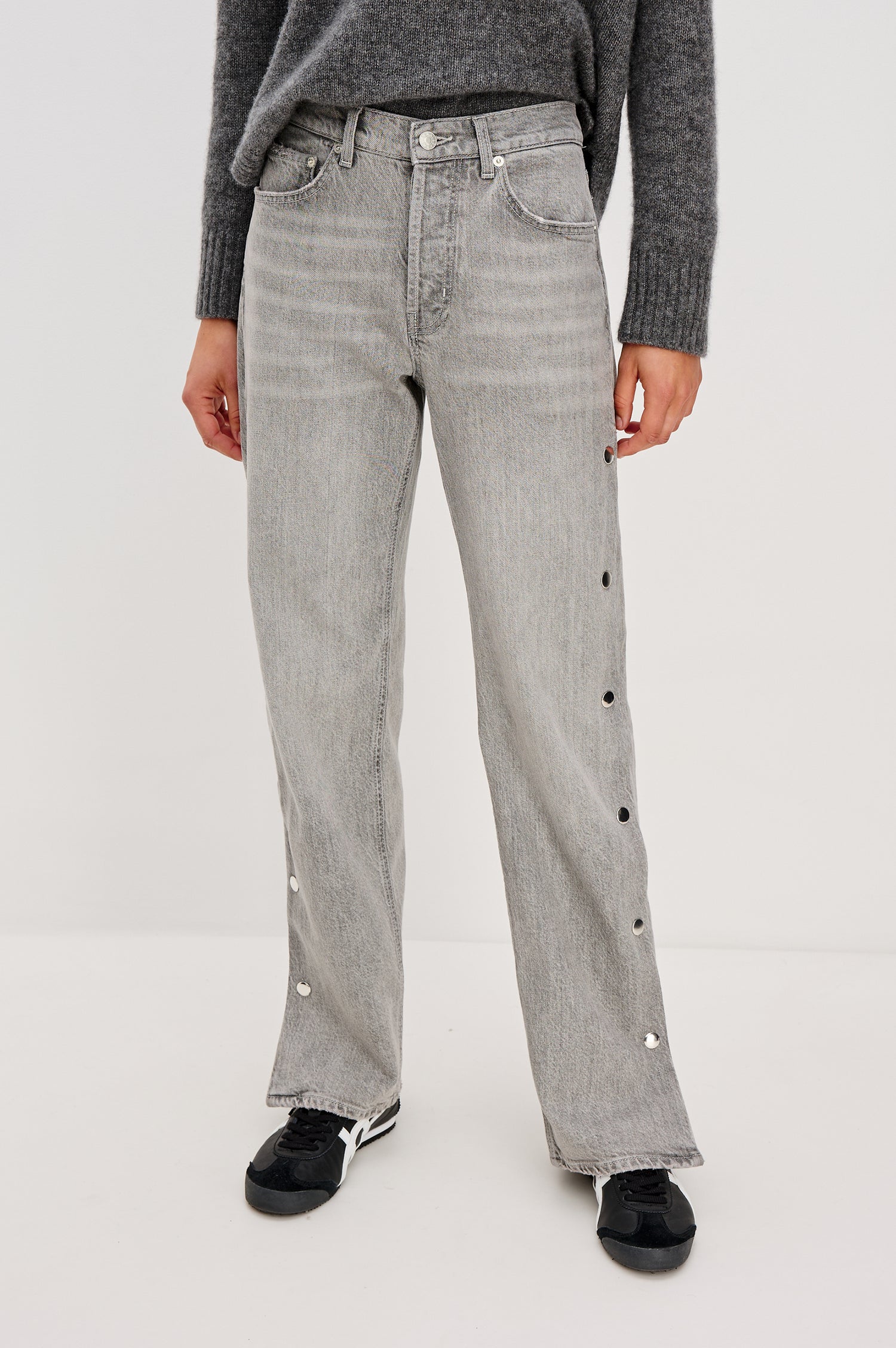 Del Mar low slung baggy boyfriend 5-pocket jean with silver metal studs on side seams and a slit at hem in a grey wash Stone Grey - front view featured on model.