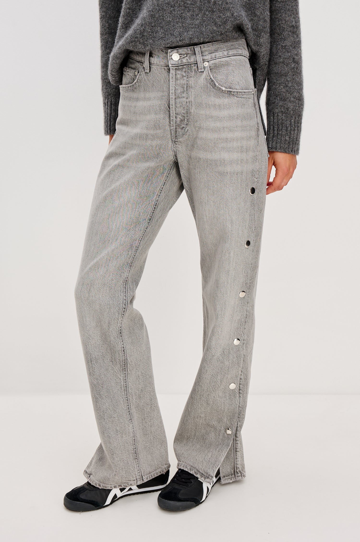 Del Mar low slung baggy boyfriend 5-pocket jean with silver metal studs on side seams and a slit at hem in a grey wash Stone Grey - front view featured on model.