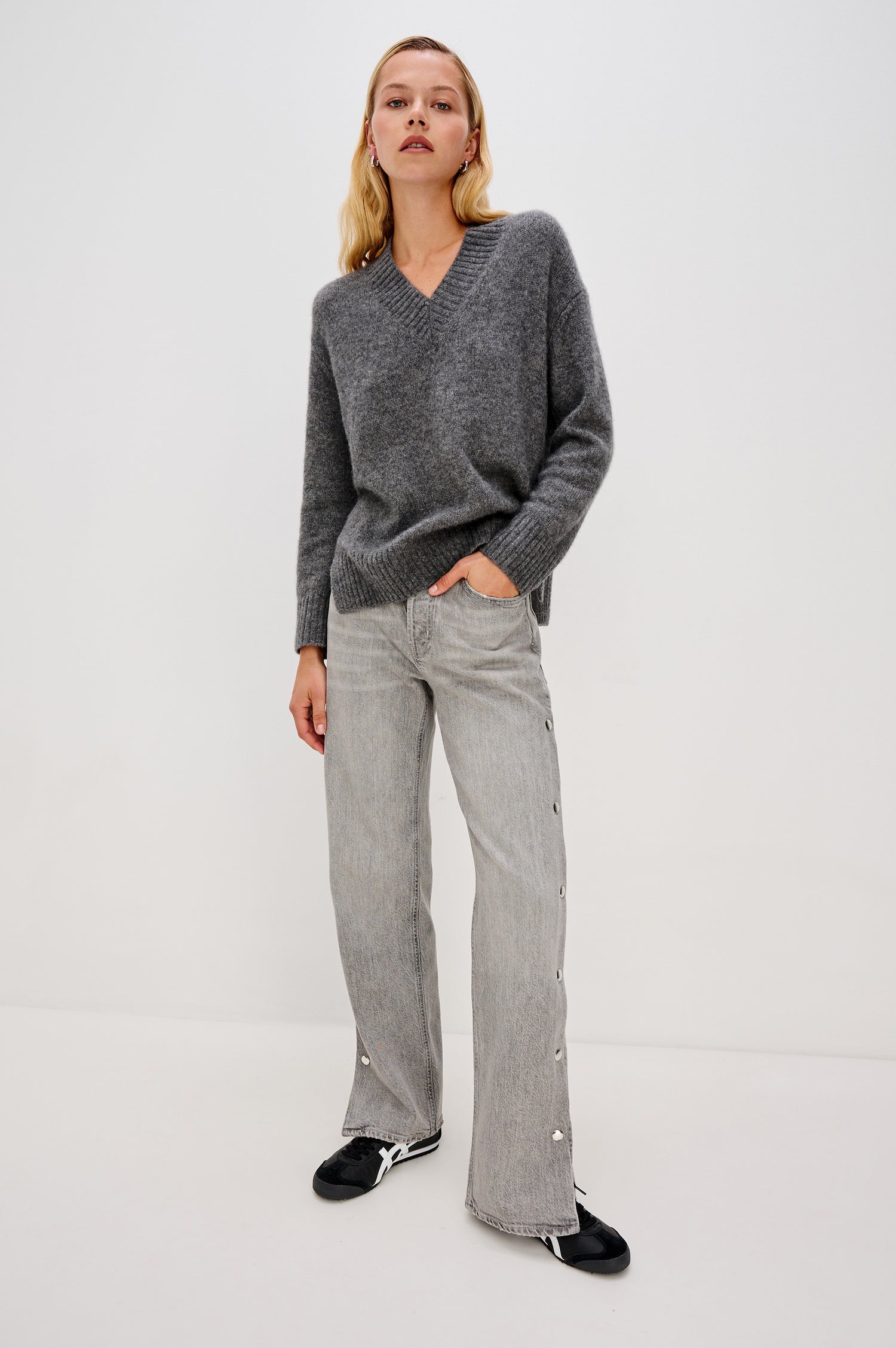 Del Mar low slung baggy boyfriend 5-pocket jean with silver metal studs on side seams and a slit at hem in a grey wash Stone Grey - front full body view featured on model.