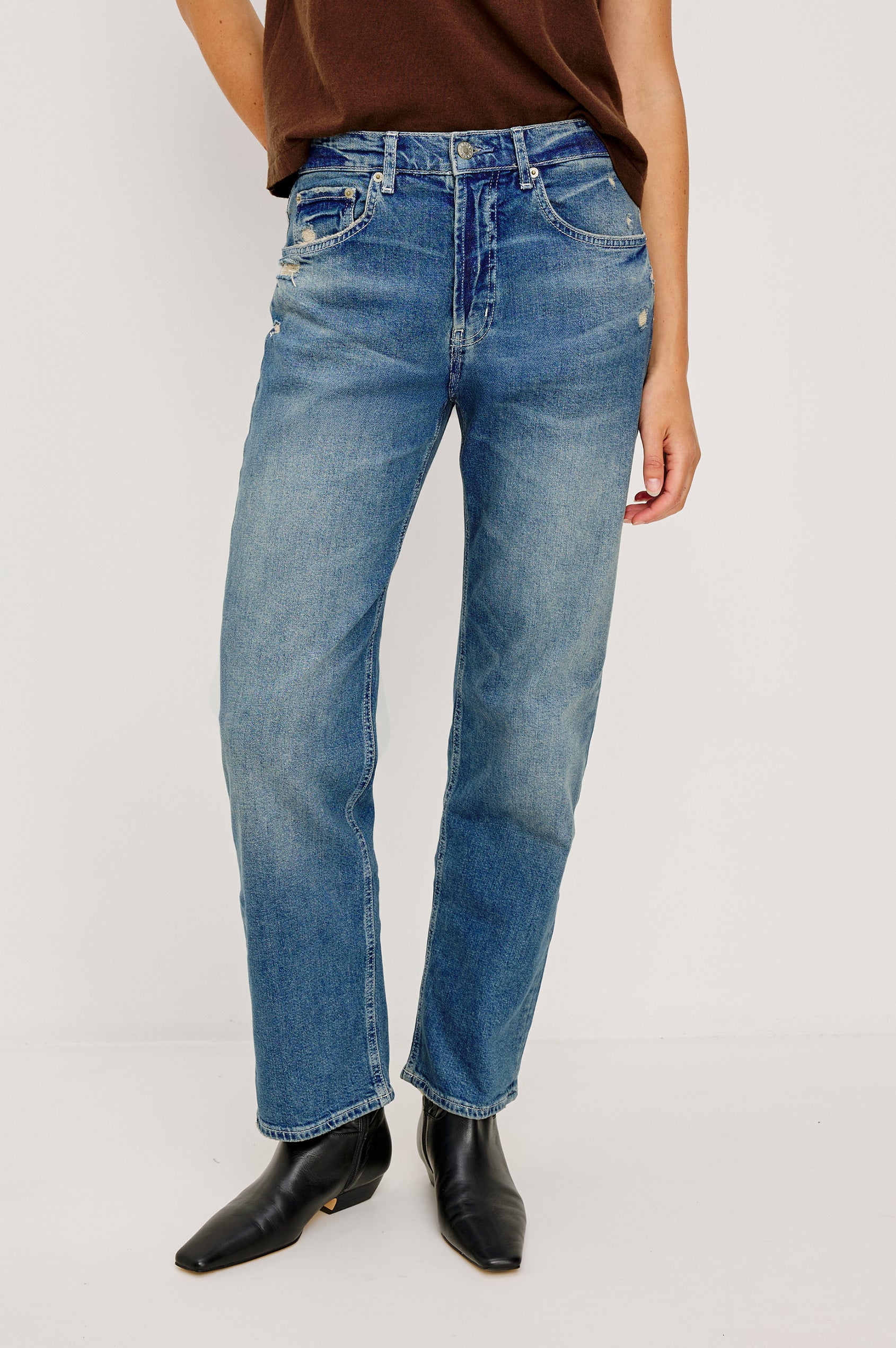 Del Mar low slung baggy boyfriend 5-pocket jean in medium wash Tinted Indigo Destroy, with light destruction near front pockets- front view featured on model.