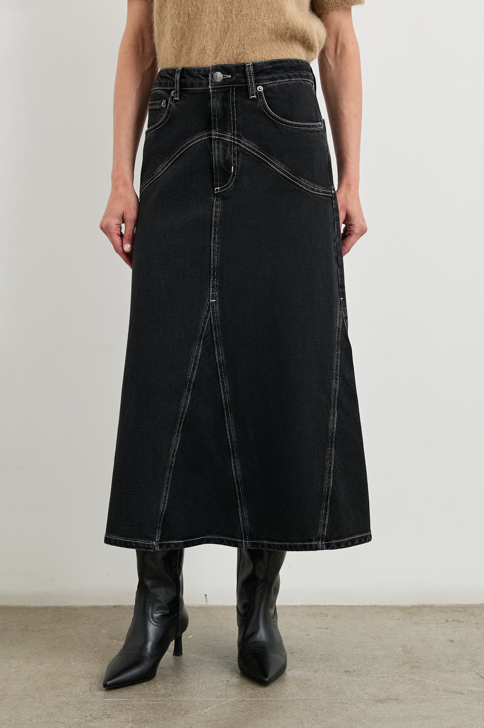 Del Rey Denim Midi Skirt with Western-Style Seams, Belt Loops, Two Front Pockets and Two Back Patch Pockets in Black Sand Colorway - Front View Featured on Model