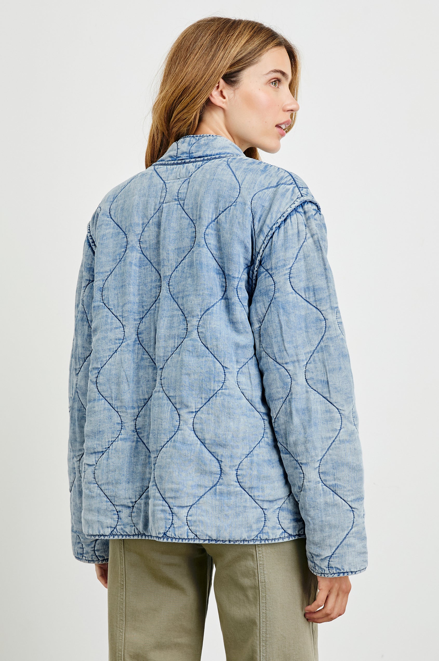 Denver Jacket with a Zip Up Closure, Two Front Patch Pockets and Quilted Stitching in Med Vintage Cloud Wash Colorway - Back View Featured on Model