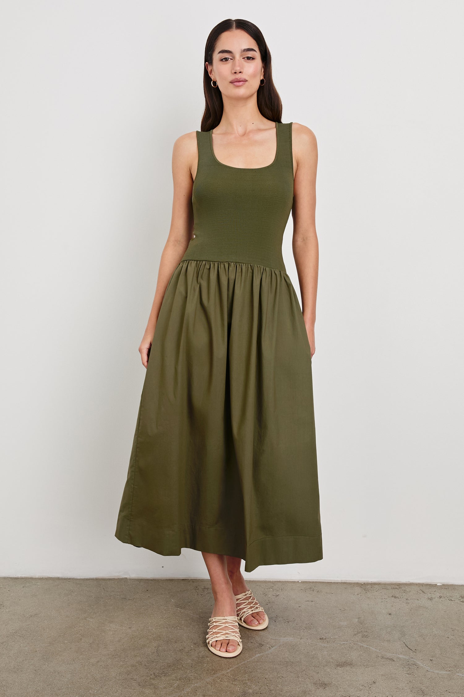 Dia tank midi dress with scoop neck and fitted bodice in Olive colorway - front view on model