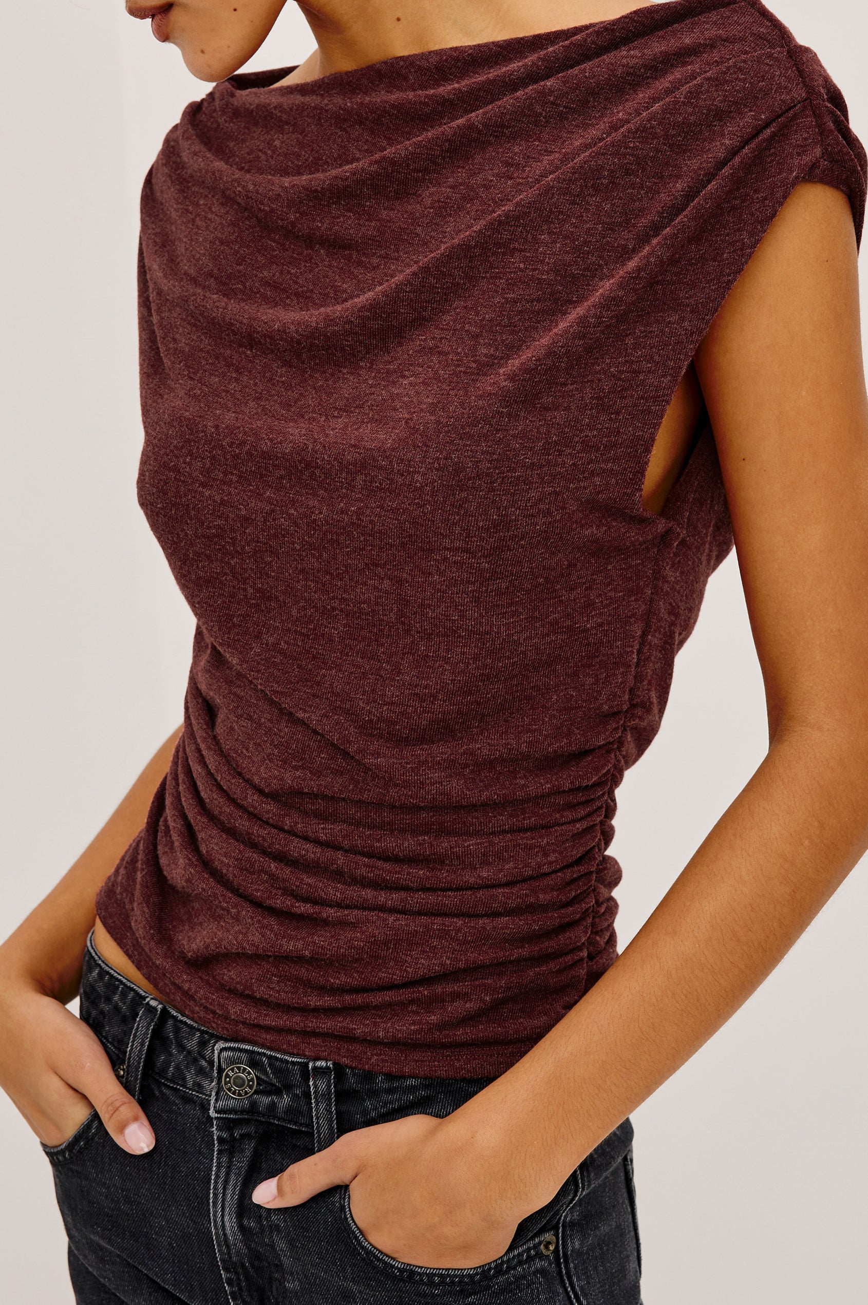 Dominic Top in Soft Jersey With Off-The-Shoulder One-Shoulder Design, Shirred Shoulders, and Ruched Waist in Merlot Colorway - Upper Body Front View Featured on Model