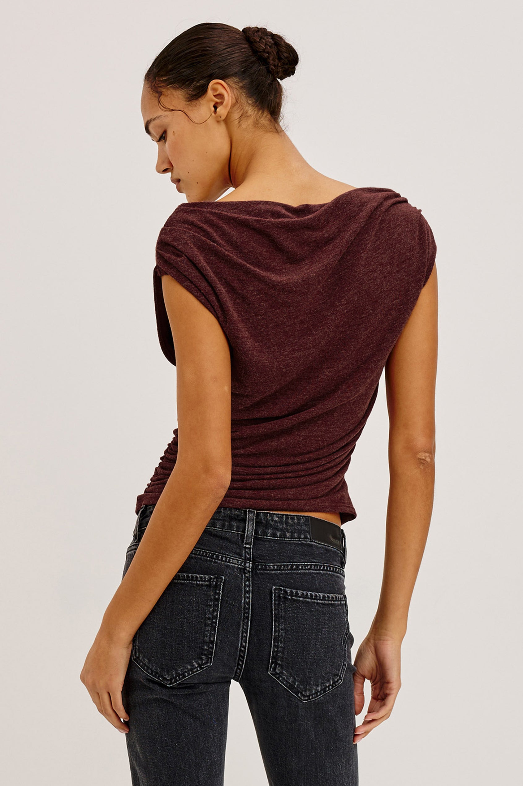 Dominic Top in Soft Jersey With Off-The-Shoulder One-Shoulder Design, Shirred Shoulders, and Ruched Waist in Merlot Colorway - Upper Body Back View Featured on Model