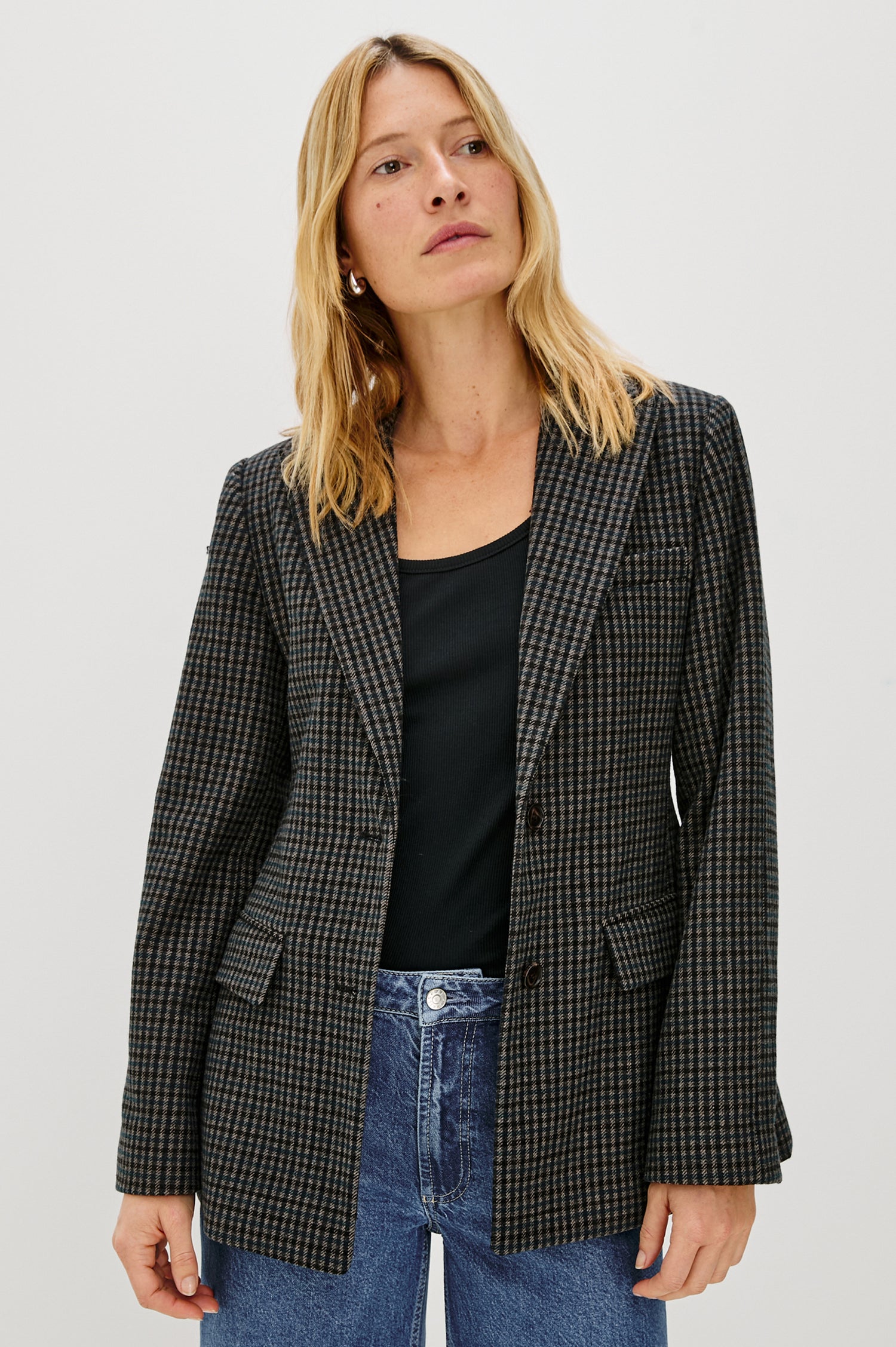 Doris tailored blazer in Glasgow Check, featuring a classic plaid pattern in tan and charcoal tones - front view featured on model.