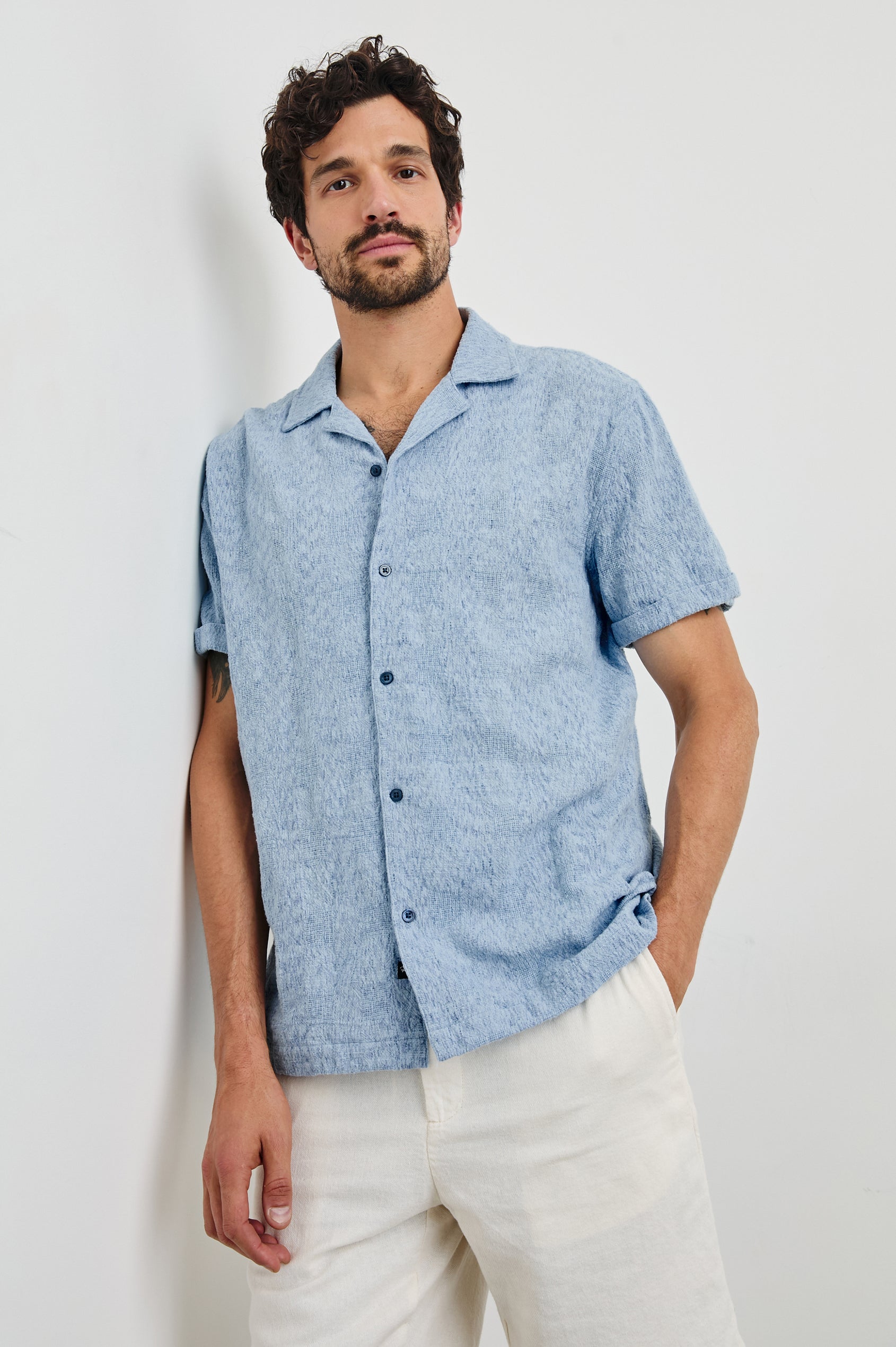 Dresden Short Sleeve Button Up with Rolled Cuffs in Cerulean Ikat Colorway - Front View Featured on Model