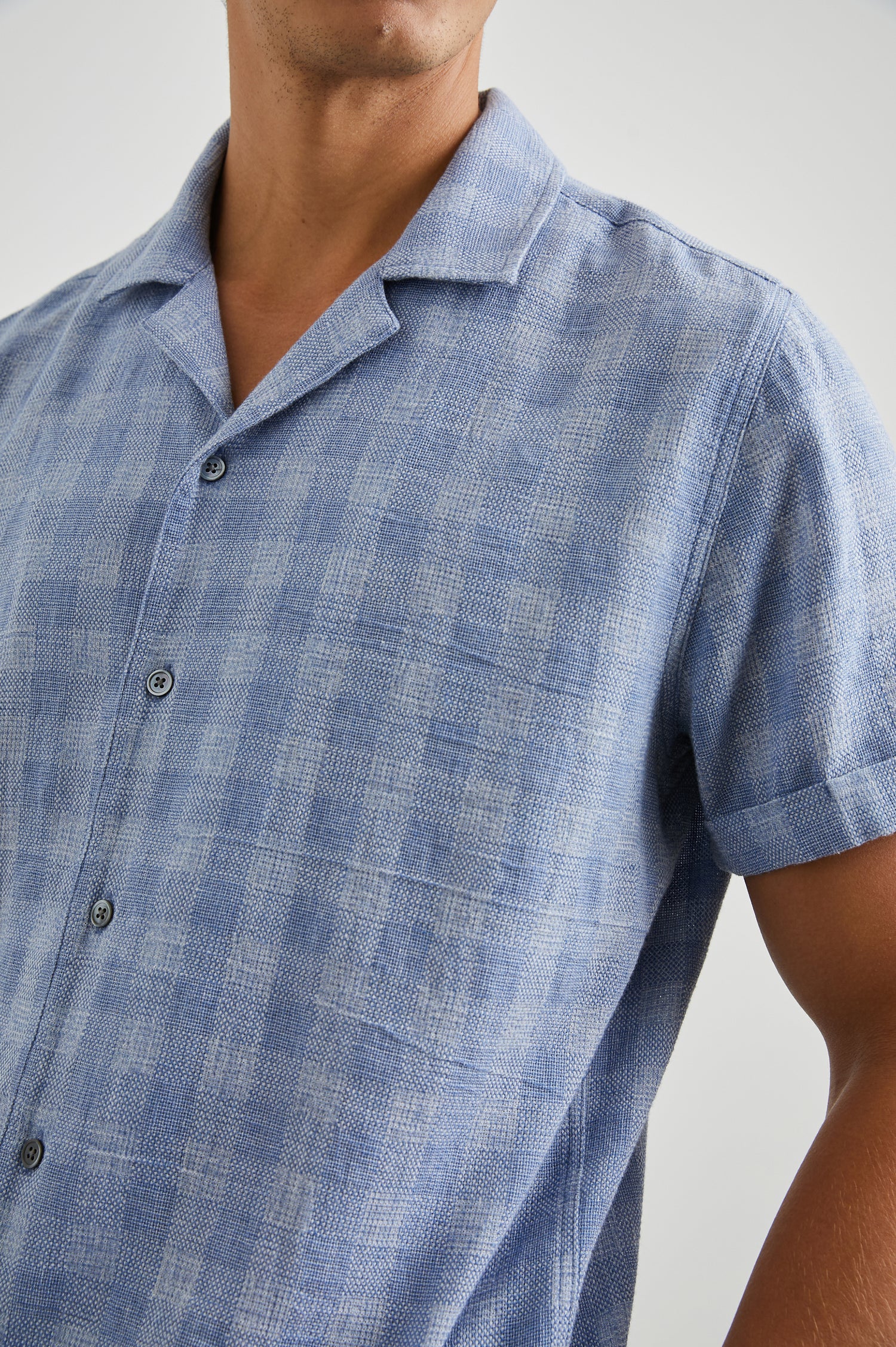 Dresden Short Sleeve Button Up with Rolled Cuffs in Home Spun Blue Gingham Colorway - Front View Featured on Model