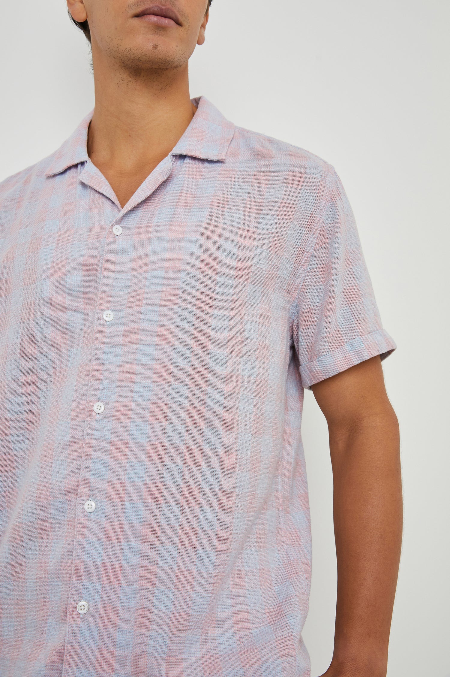 Dresden Short Sleeve Button Up with Rolled Cuffs in Home Spun Rouge Gingham Colorway, Rouge and Blue - Front View Featured on Model