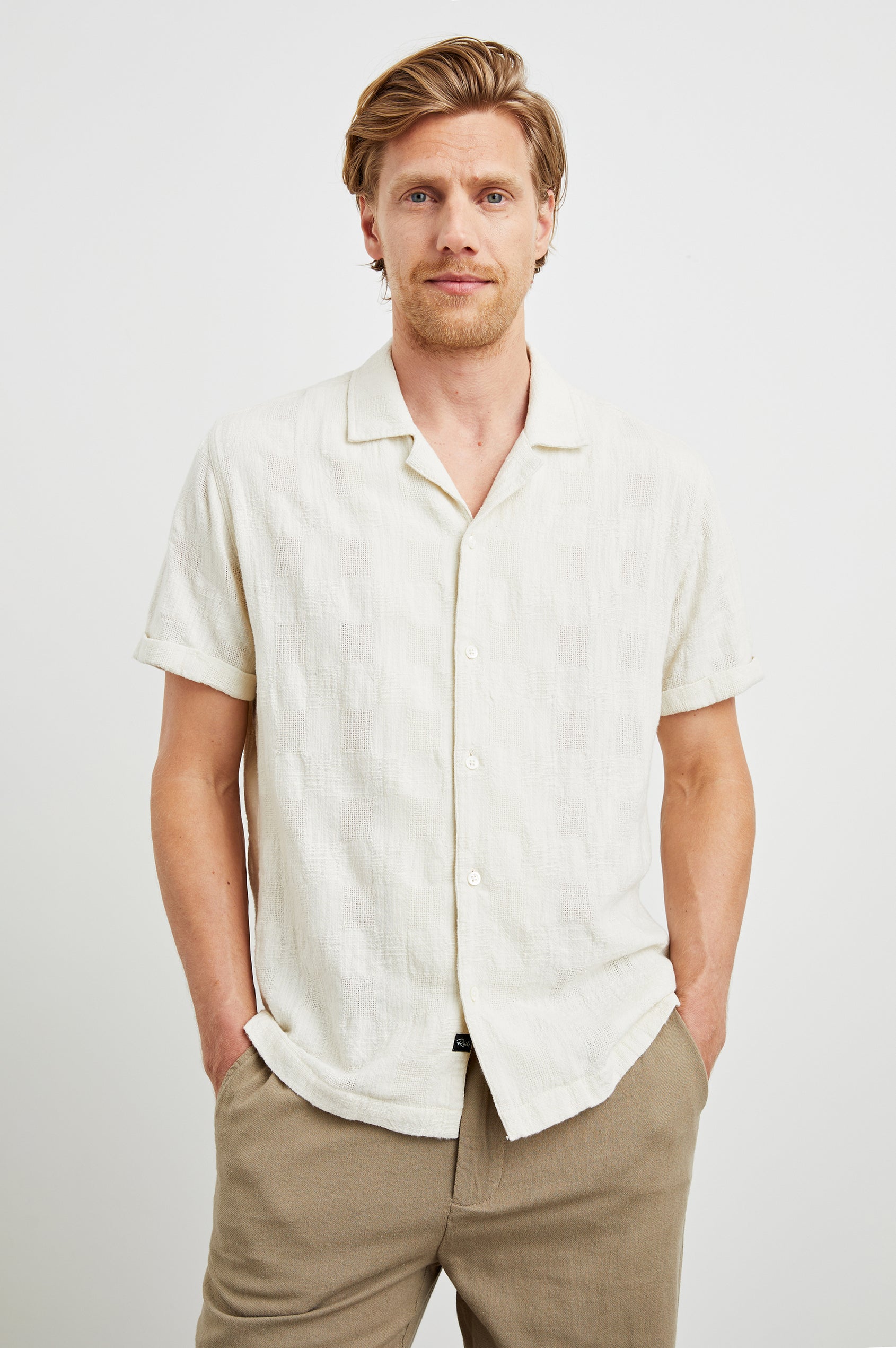 Dresden Short Sleeve Button Up with Rolled Cuffs in Parchment Colorway - Front View Featured on Model