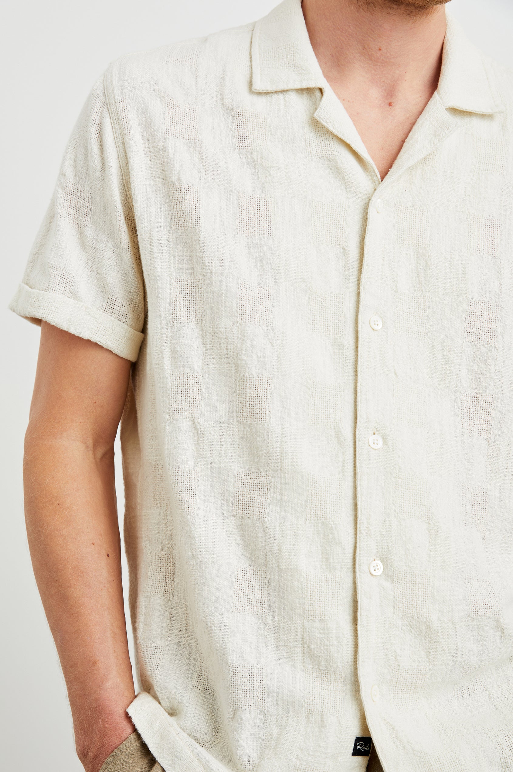 Dresden Short Sleeve Button Up with Rolled Cuffs in Parchment Colorway - Front View Featured on Model